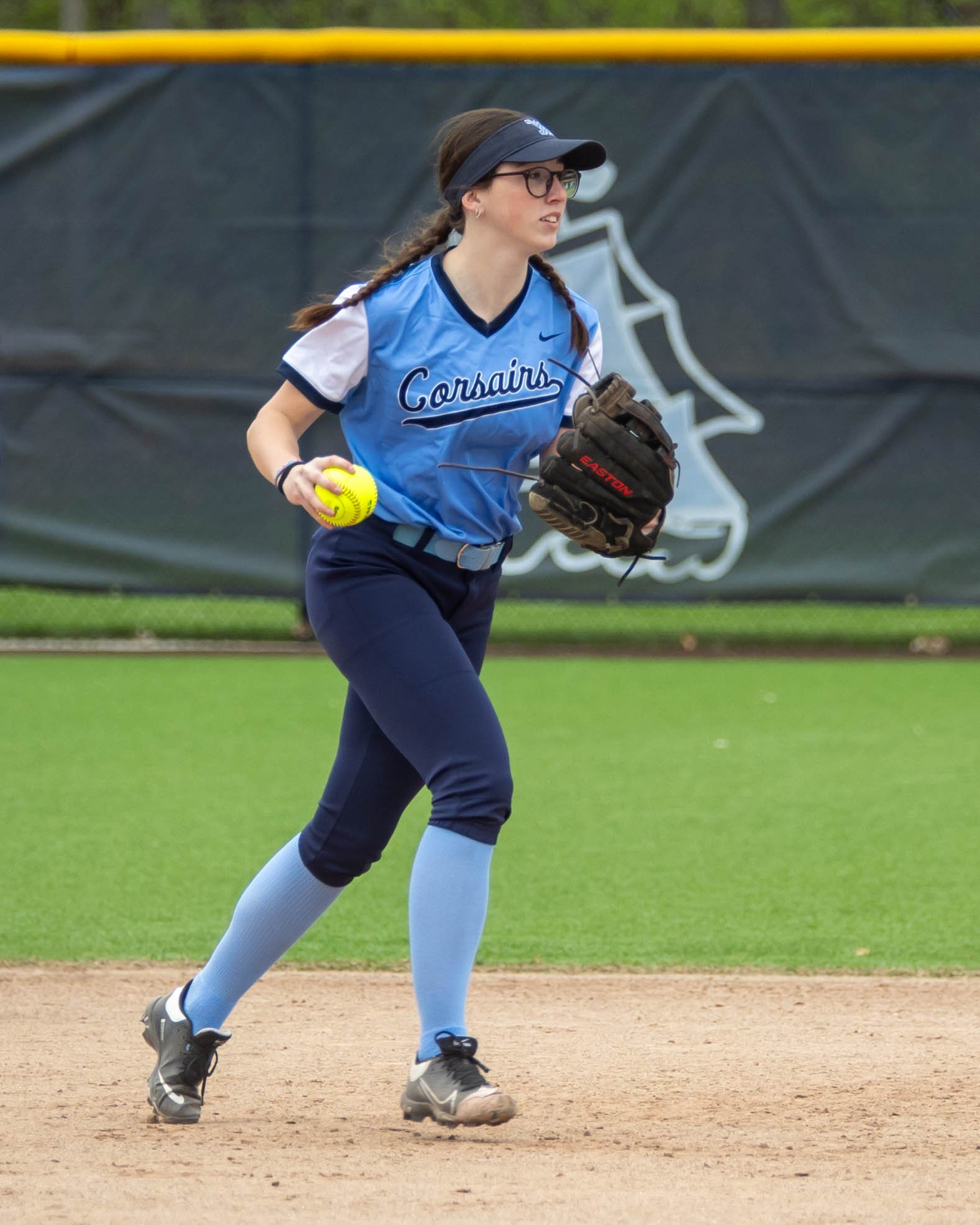 Mott short stop walks the ball to second base