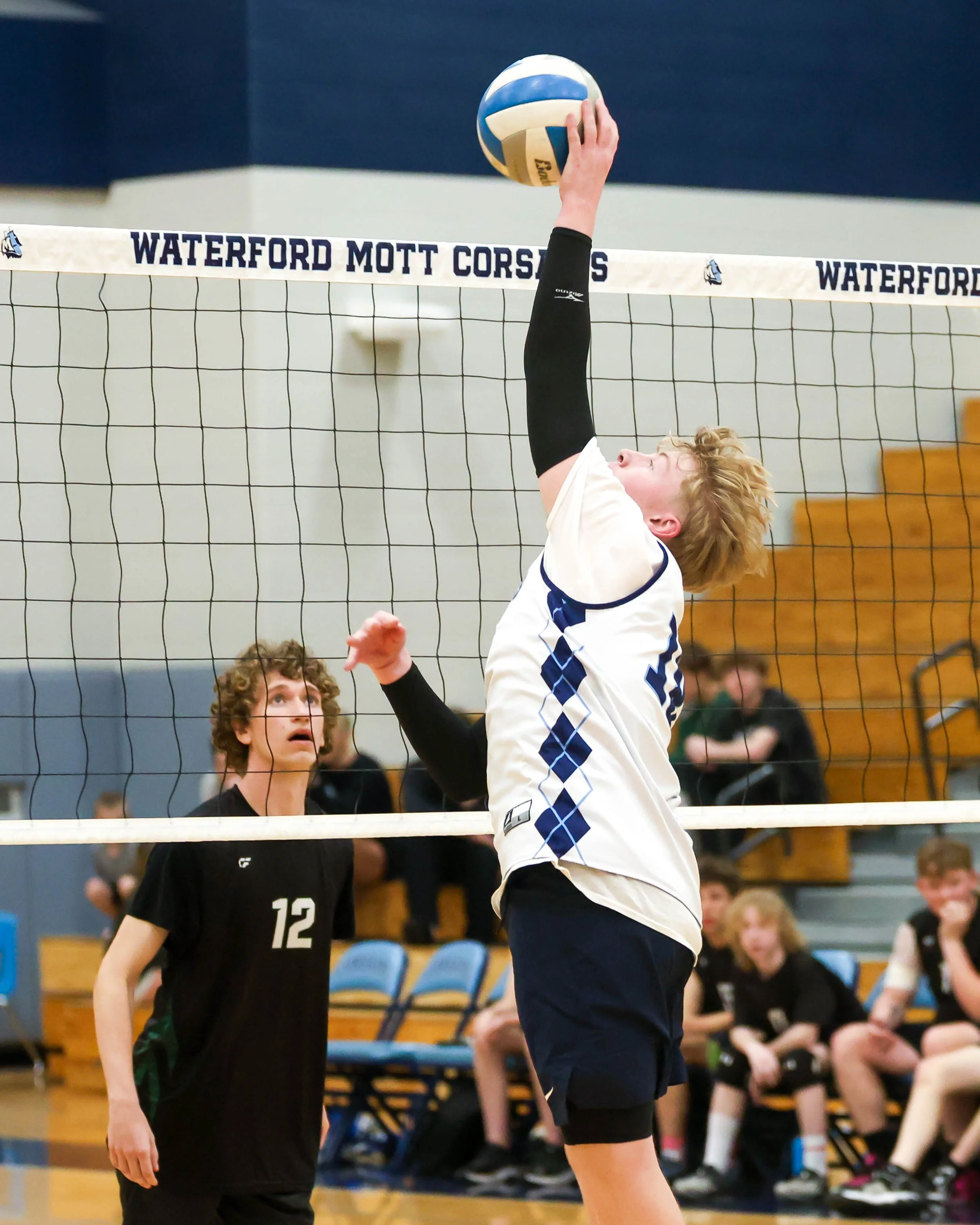 Mott #18 returns the ball