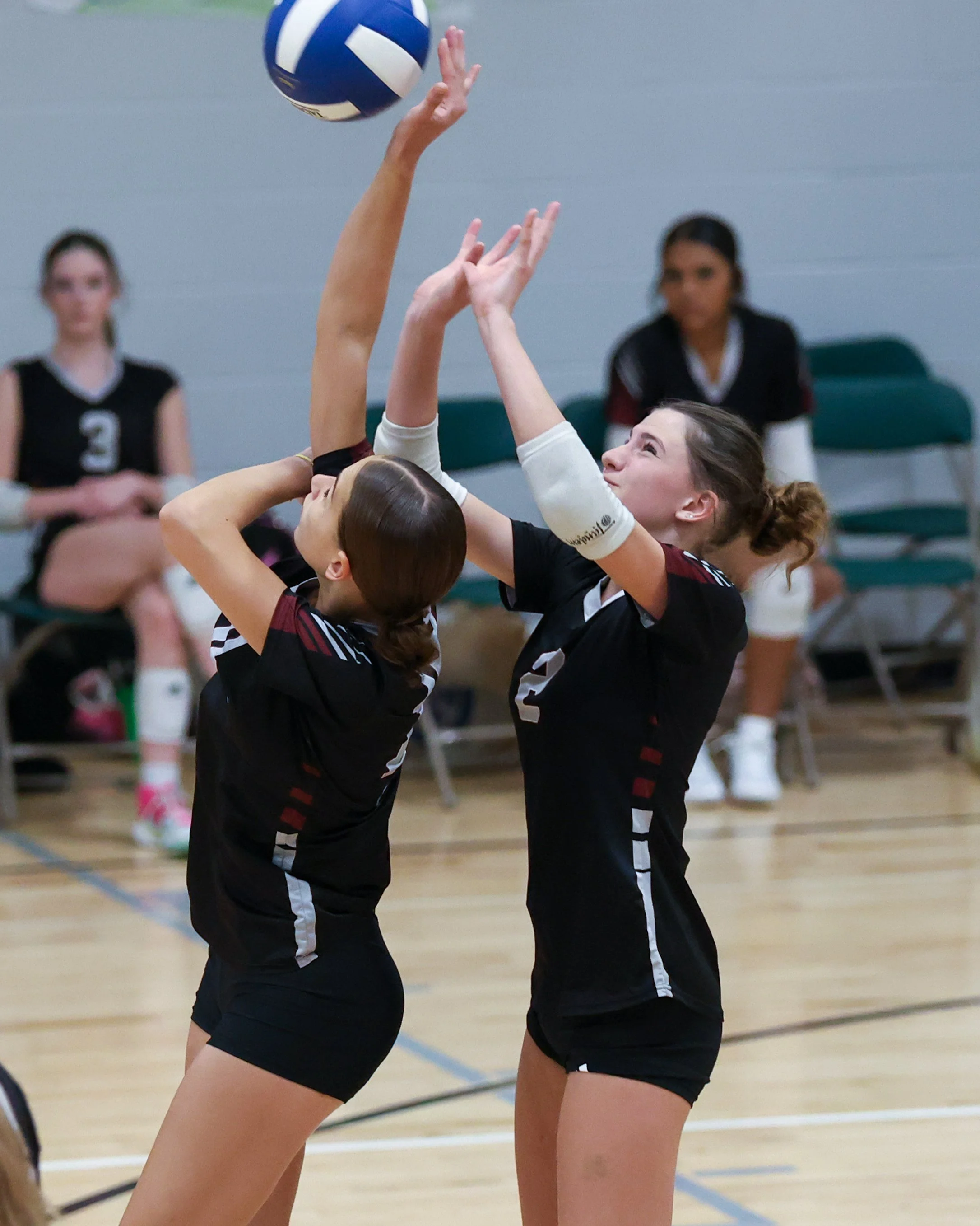 Mason girl returns the ball