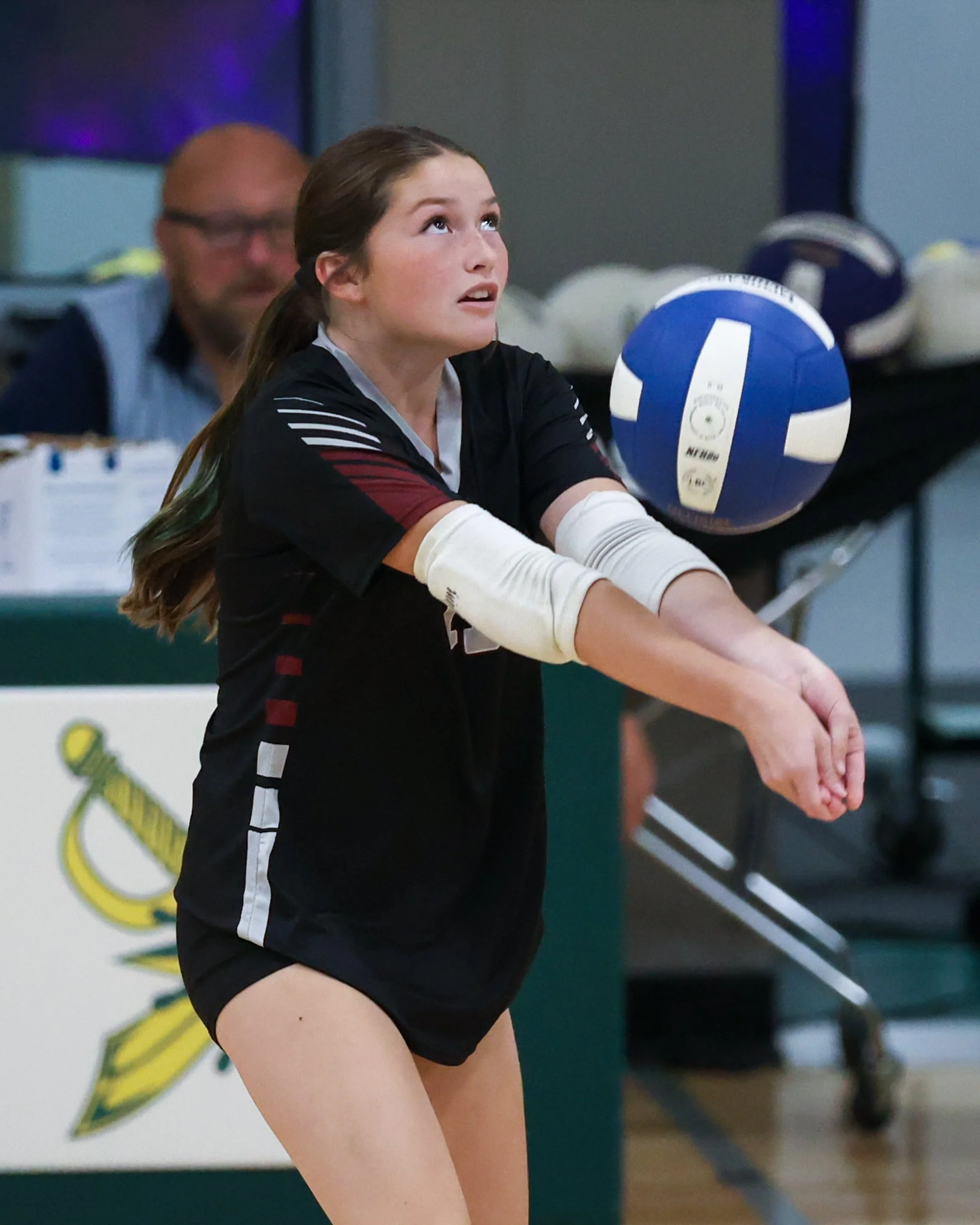 Mason girl returns the ball