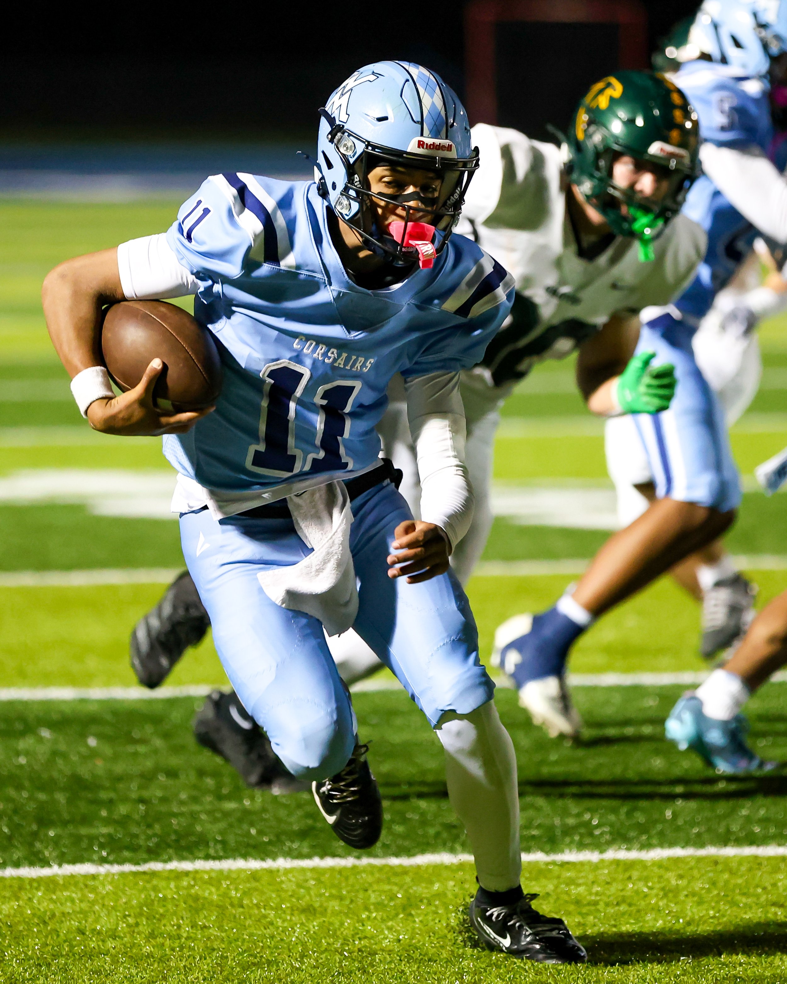 Mott #11 runs with the ball