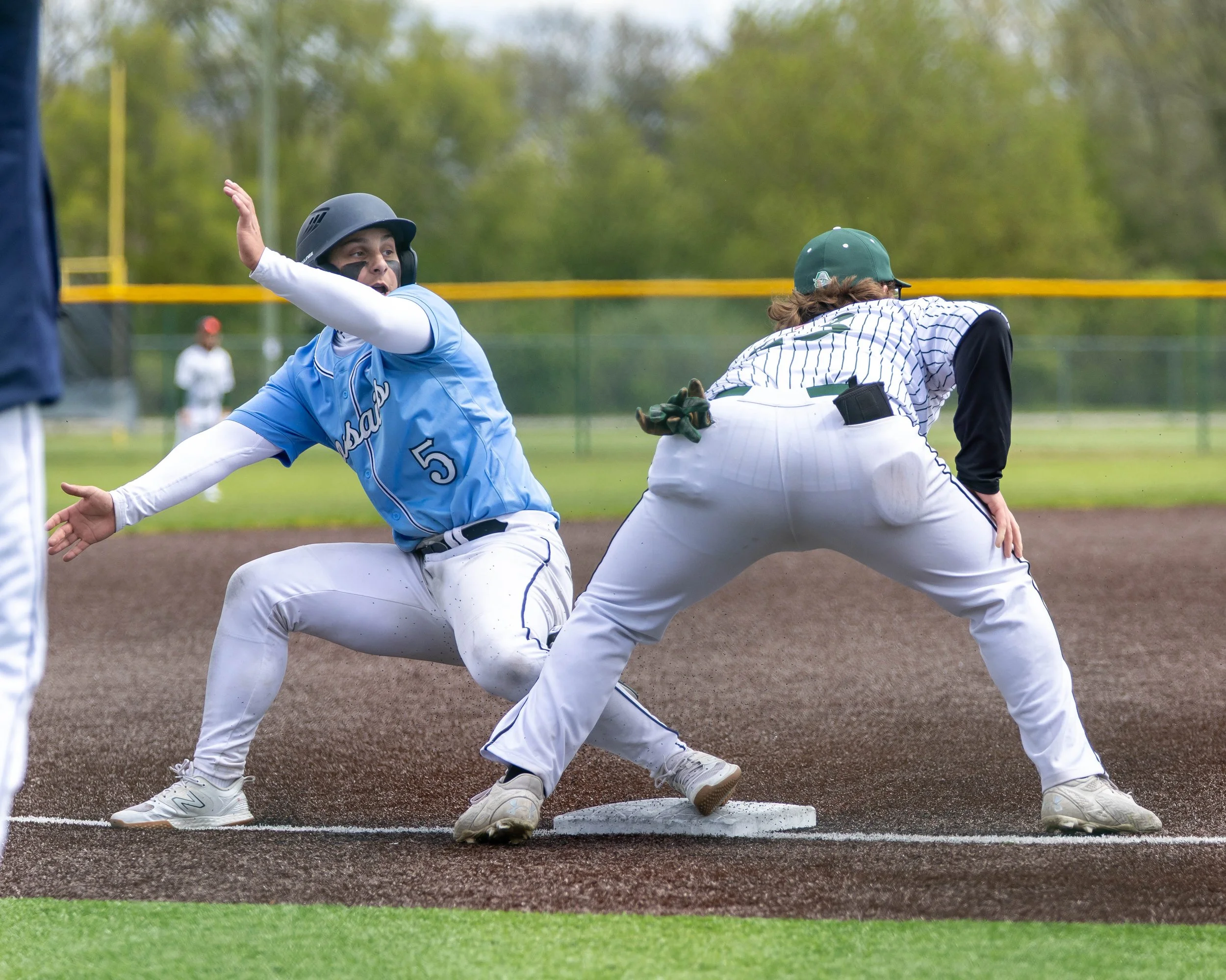 Mott #5 almost tagged out at 3rd base