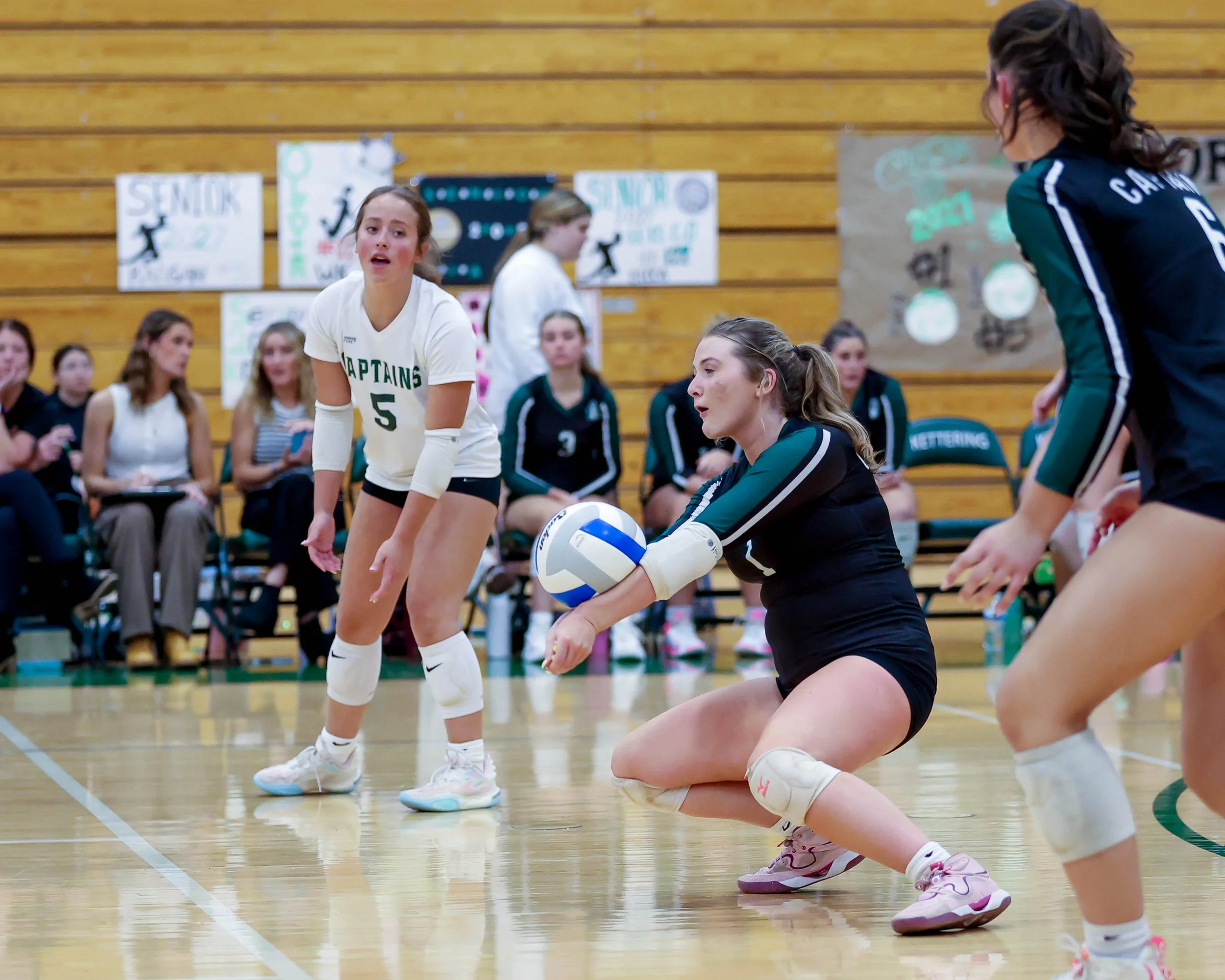 Kettering #1 returns the ball