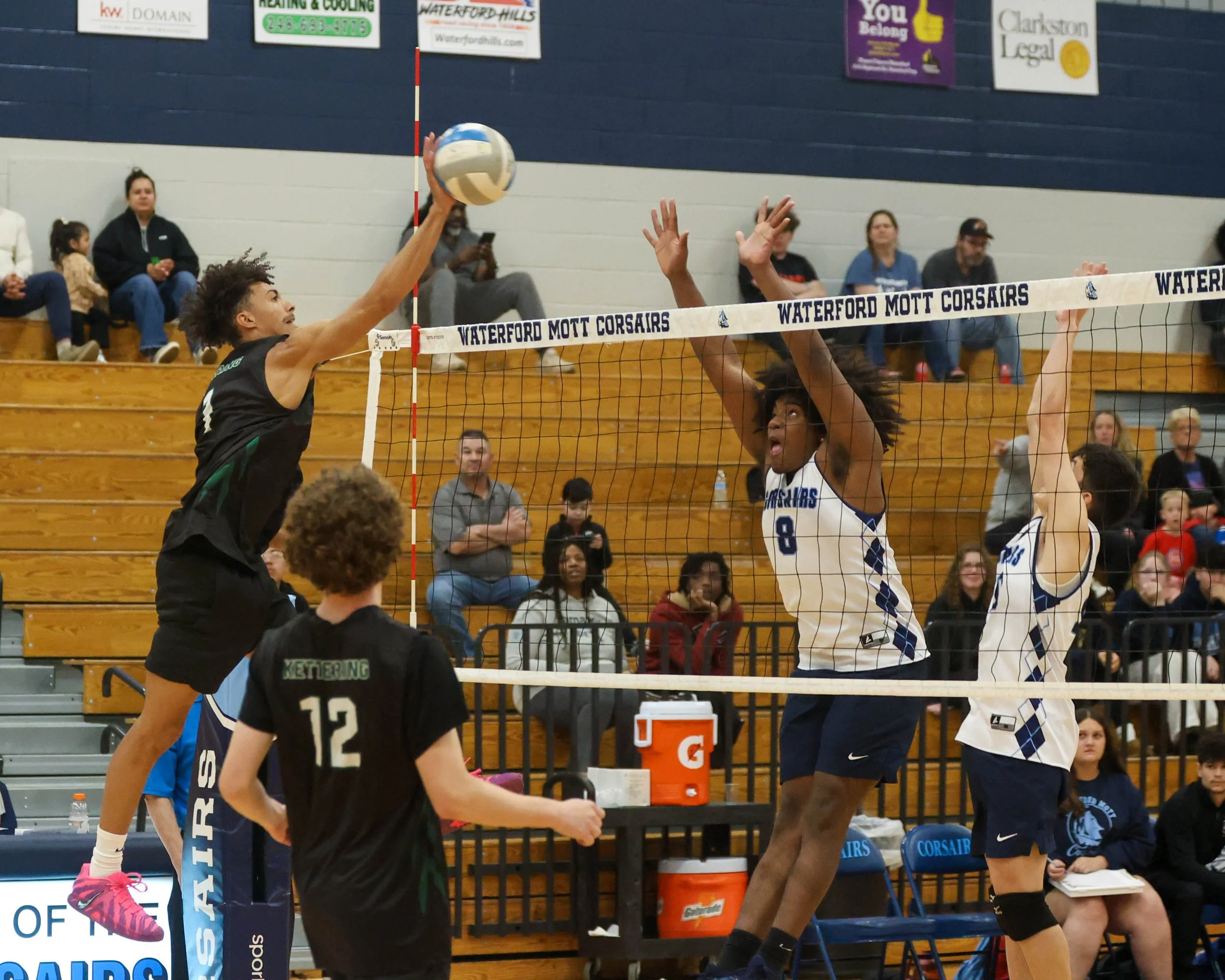 Kettering #1 spikes the ball