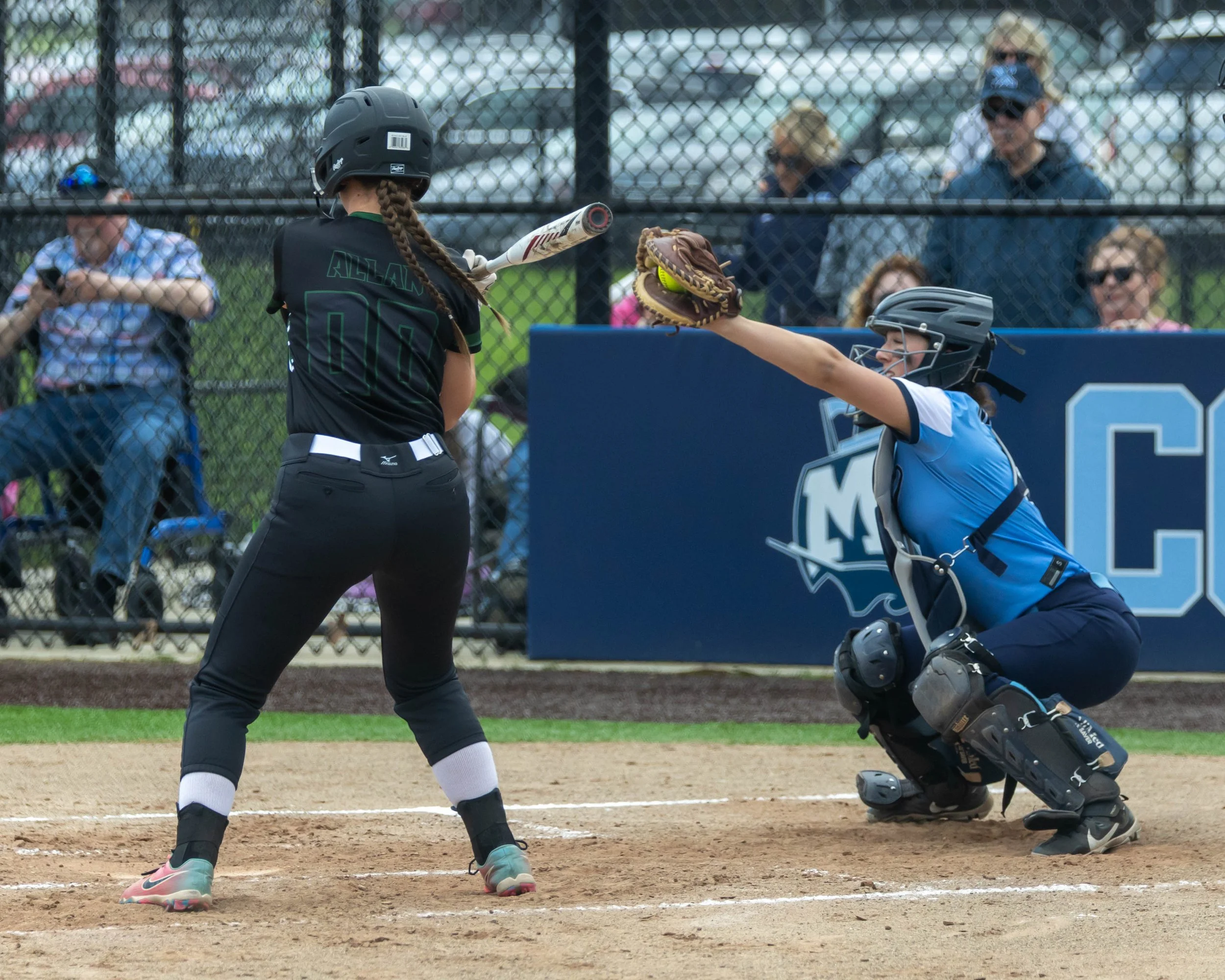 Mott catcher catches a high ball