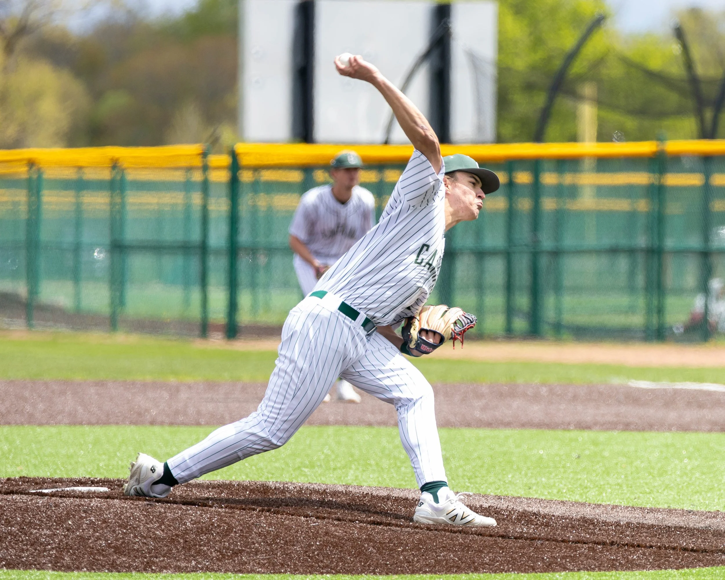 Kettering pitcher throws the ball to home