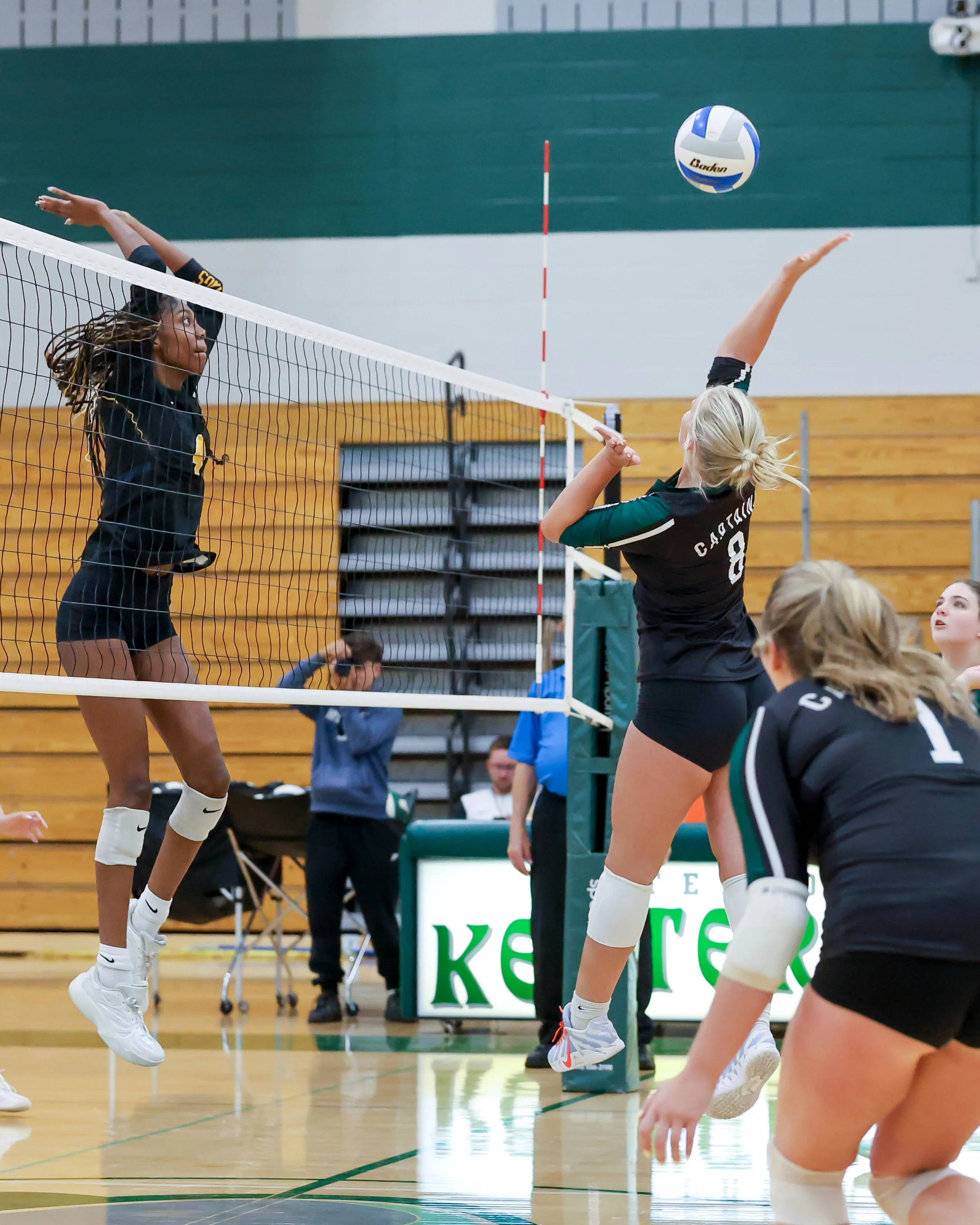 Kettering #8 spikes the ball