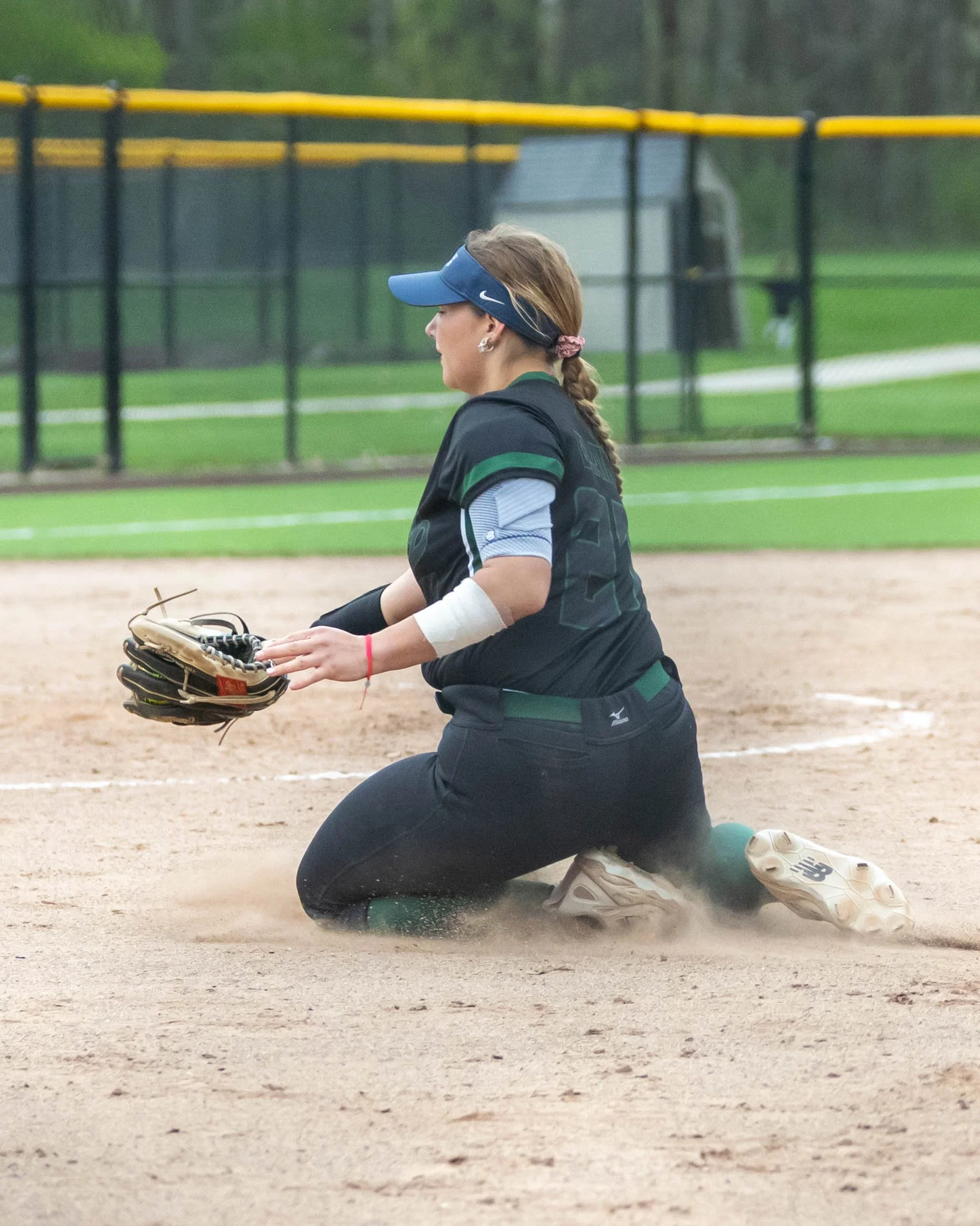 Kettering first base on her knees to pick up a bunt