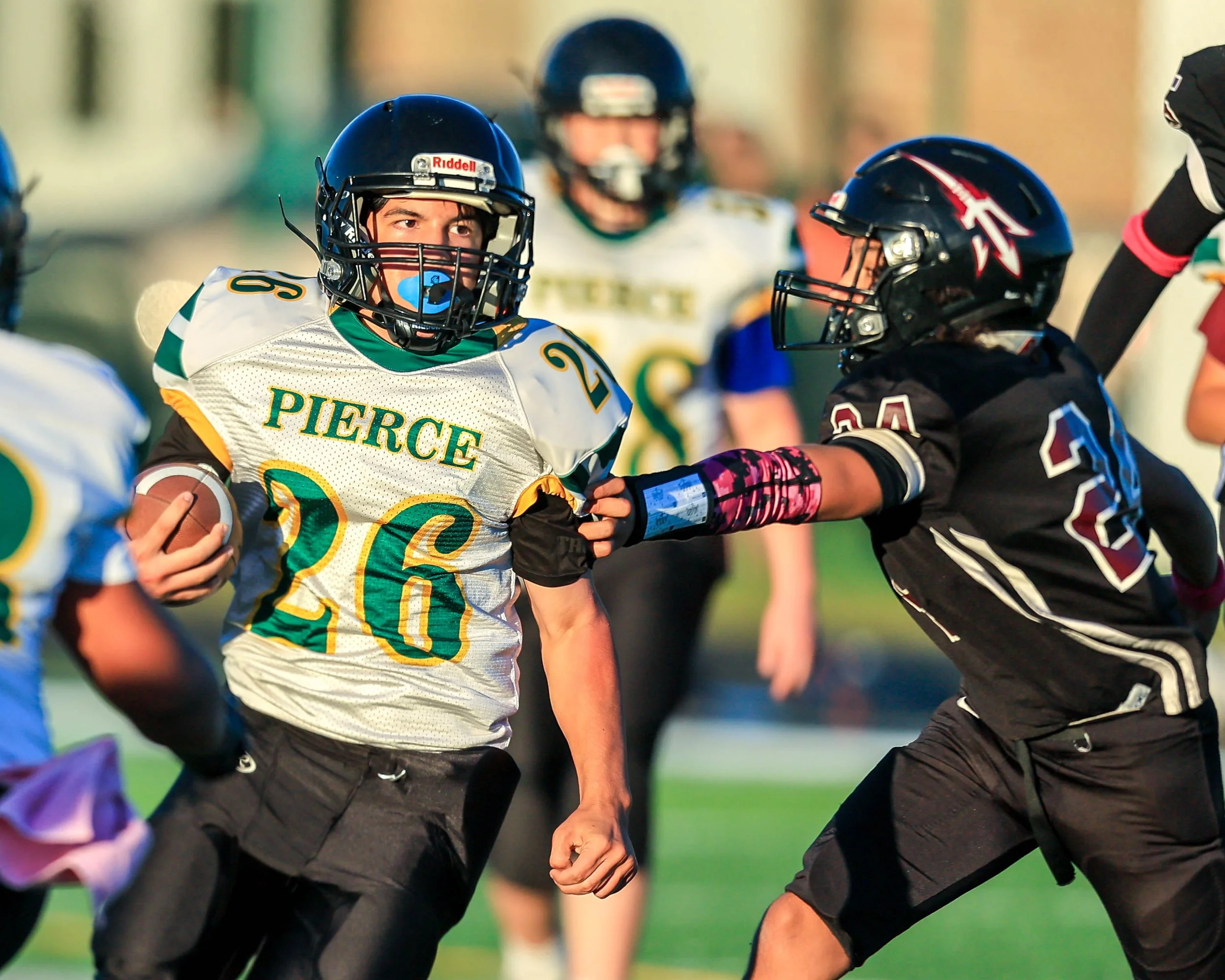 Pierce #26 runs with the ball
