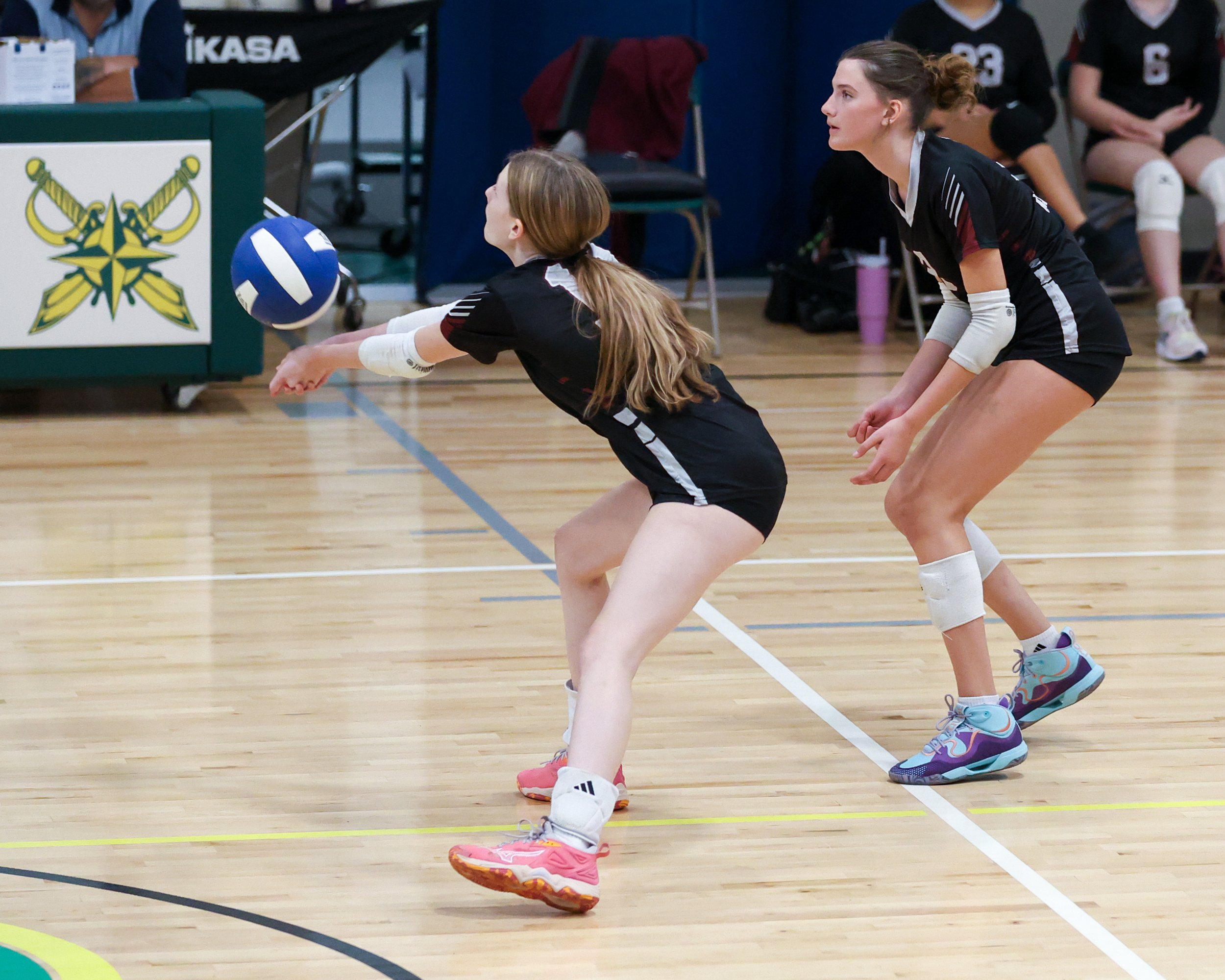 Mason girl returns the ball