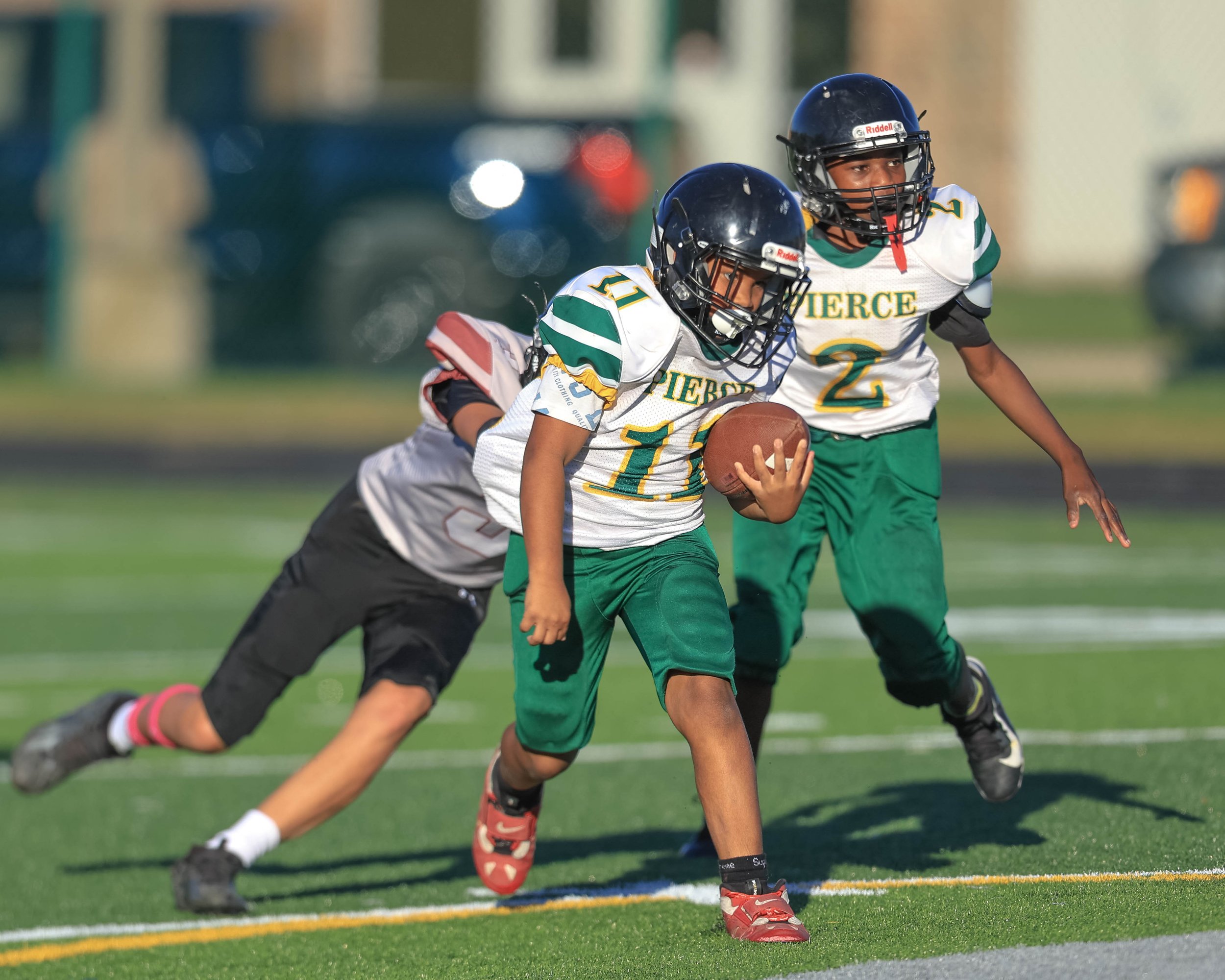 Pierce #11 runs with the ball