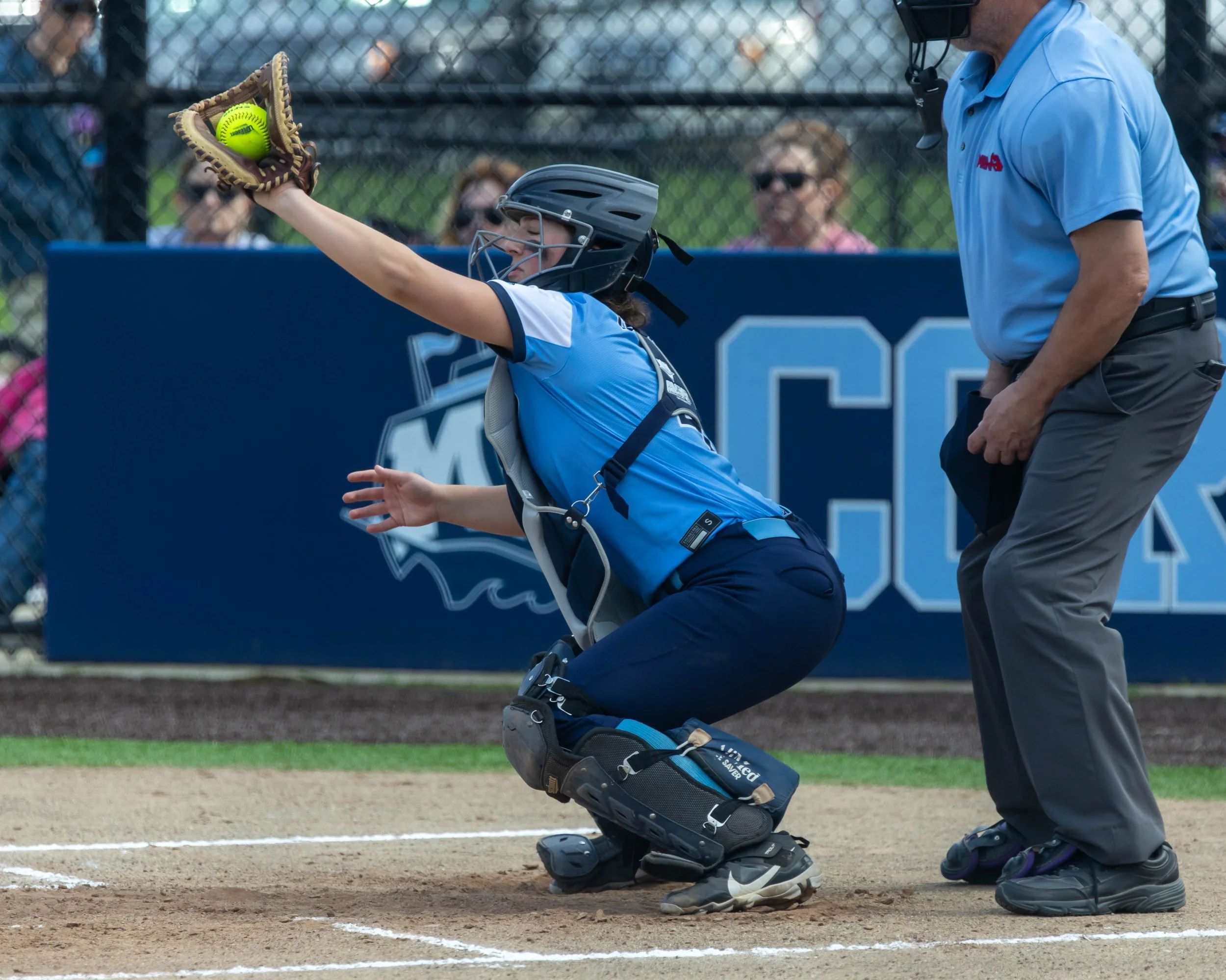 Mott catcher with the ball in her glove