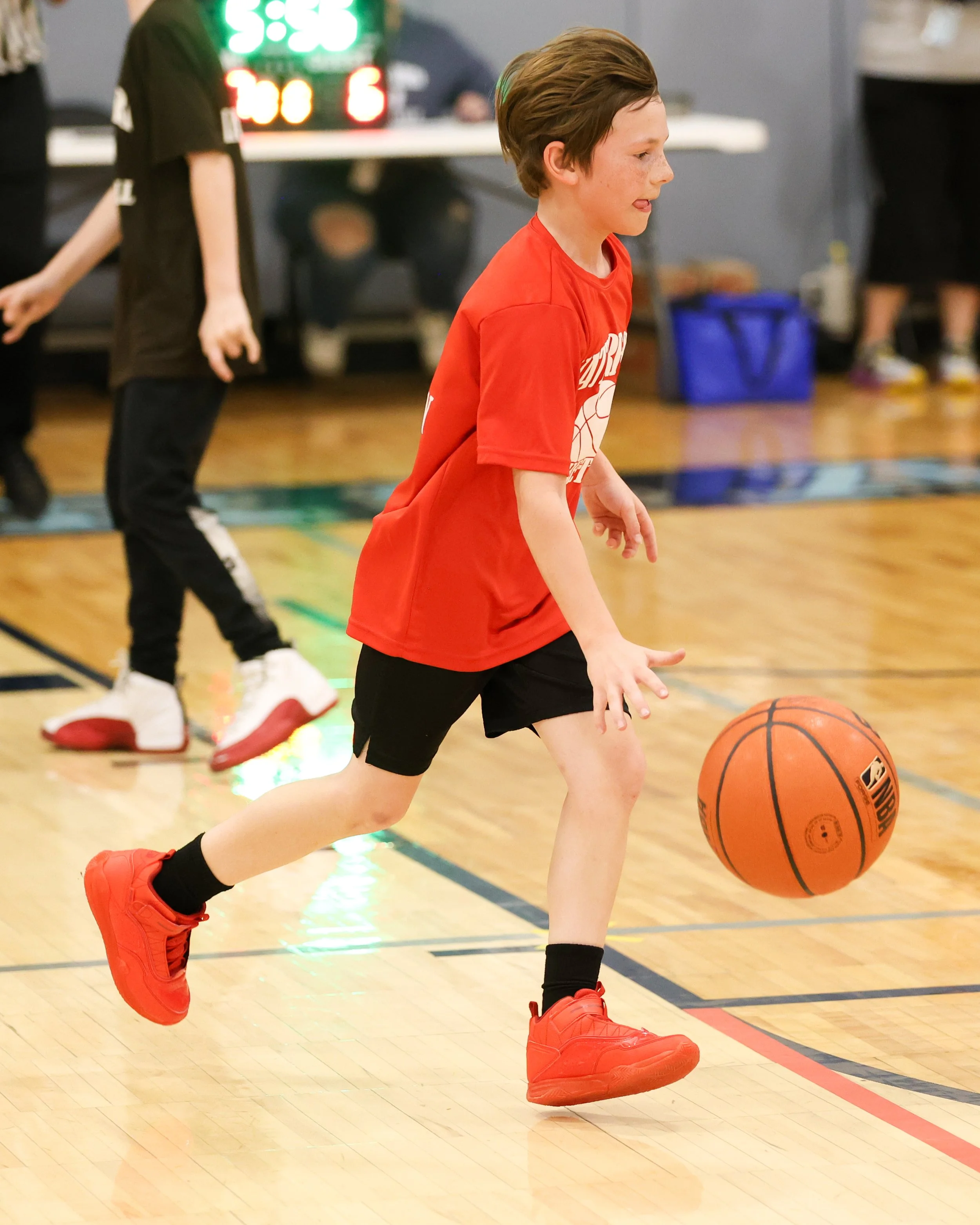 Houghton boy dribbles the ball