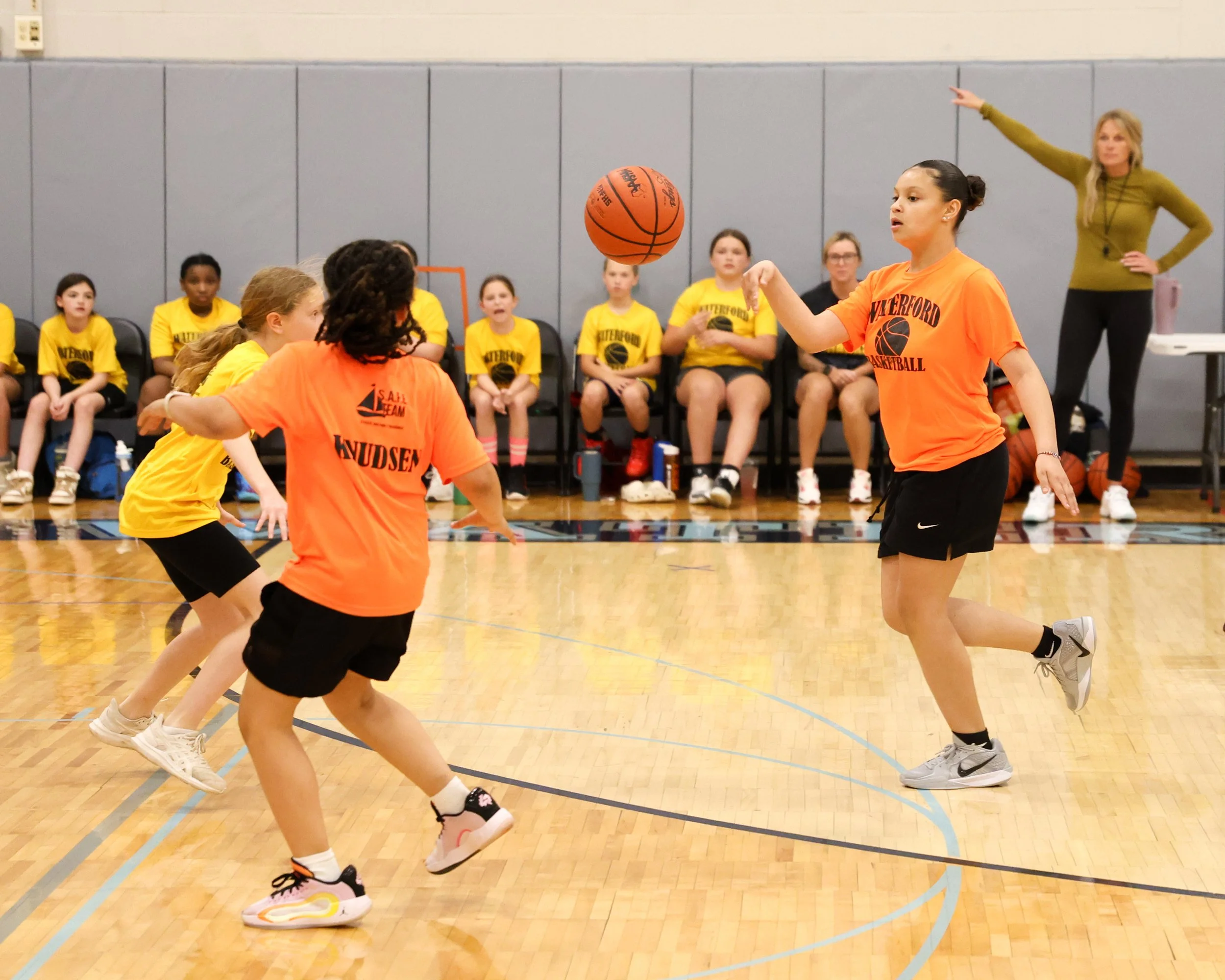 Houghton girl pass ball to teammate