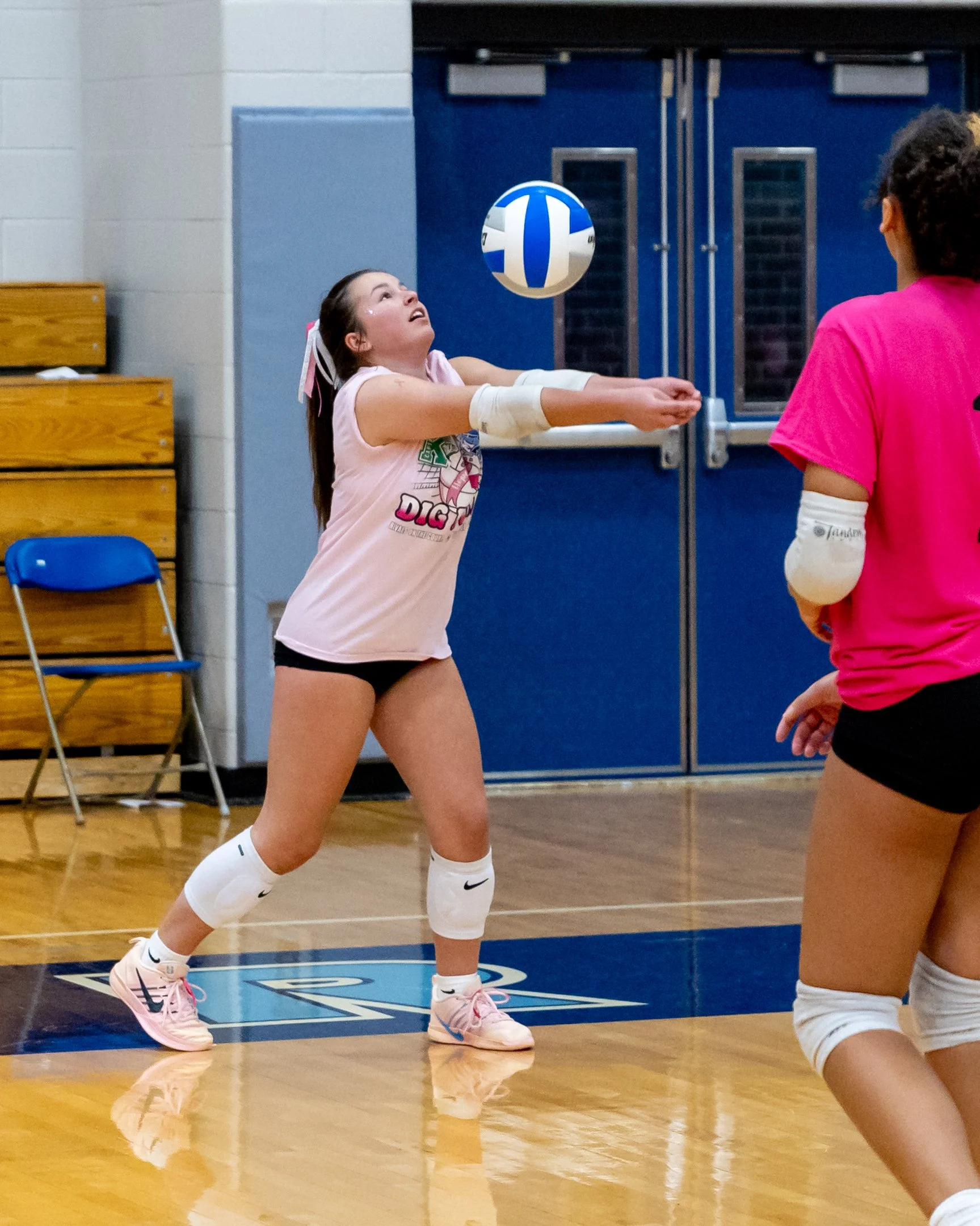 Kettering player hits the ball