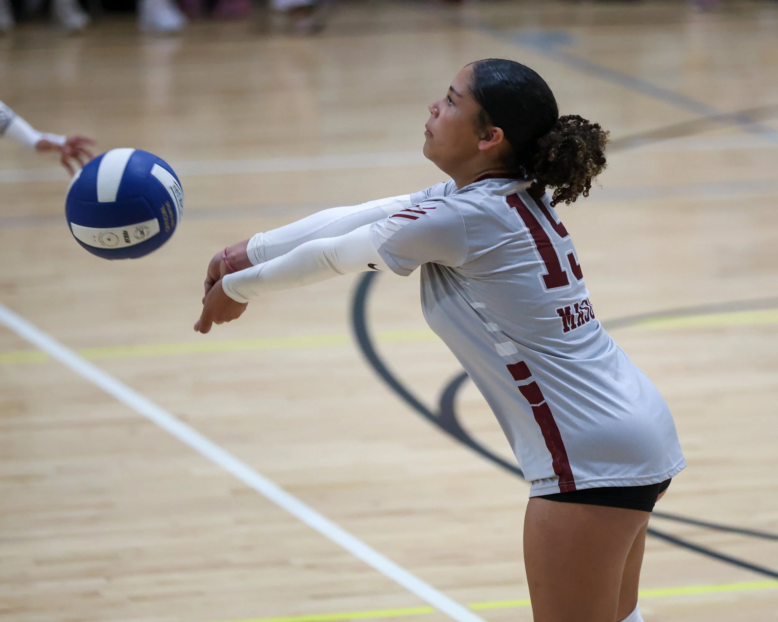 Mason girl returns the ball