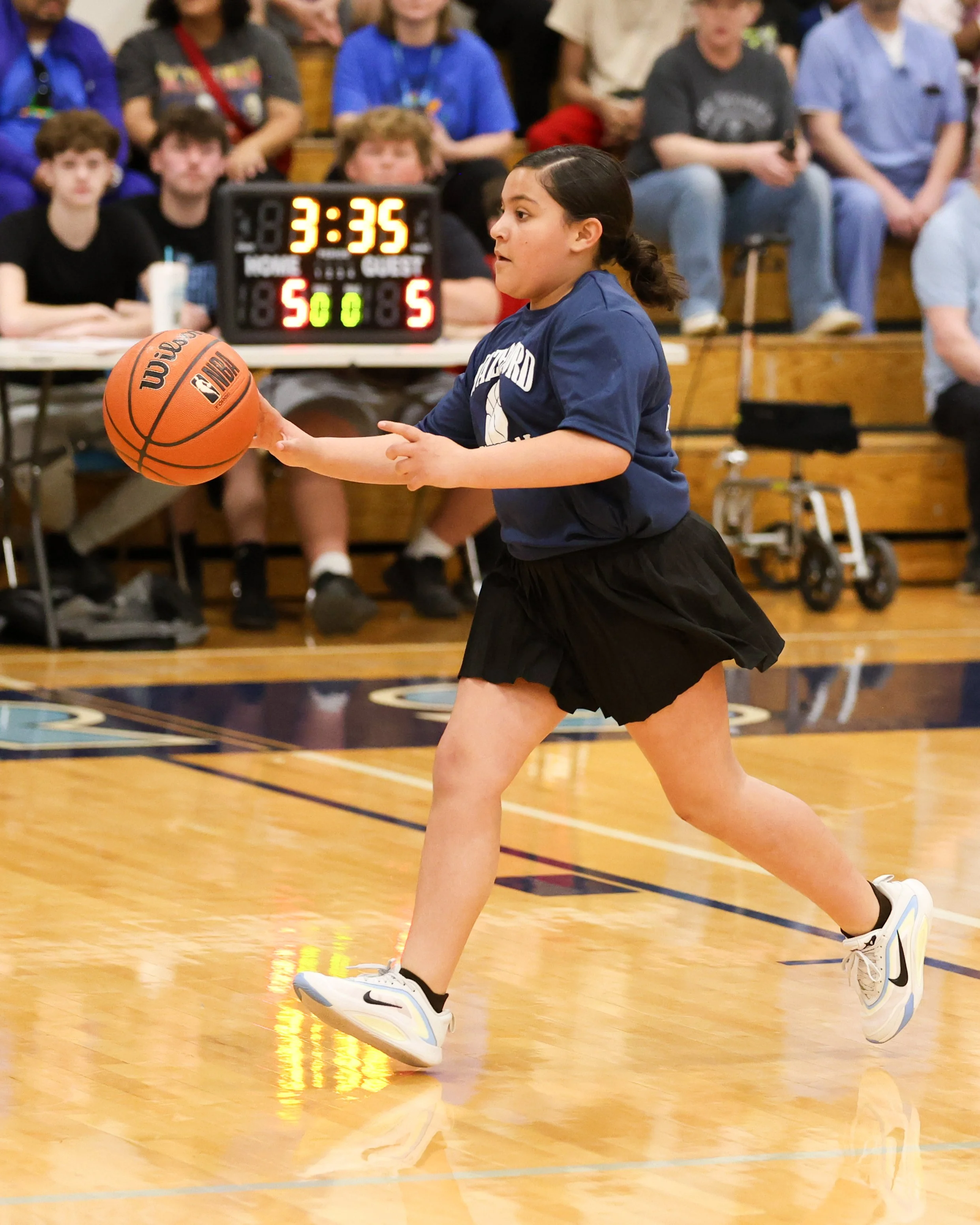 Donaldson girl dribbles the ball