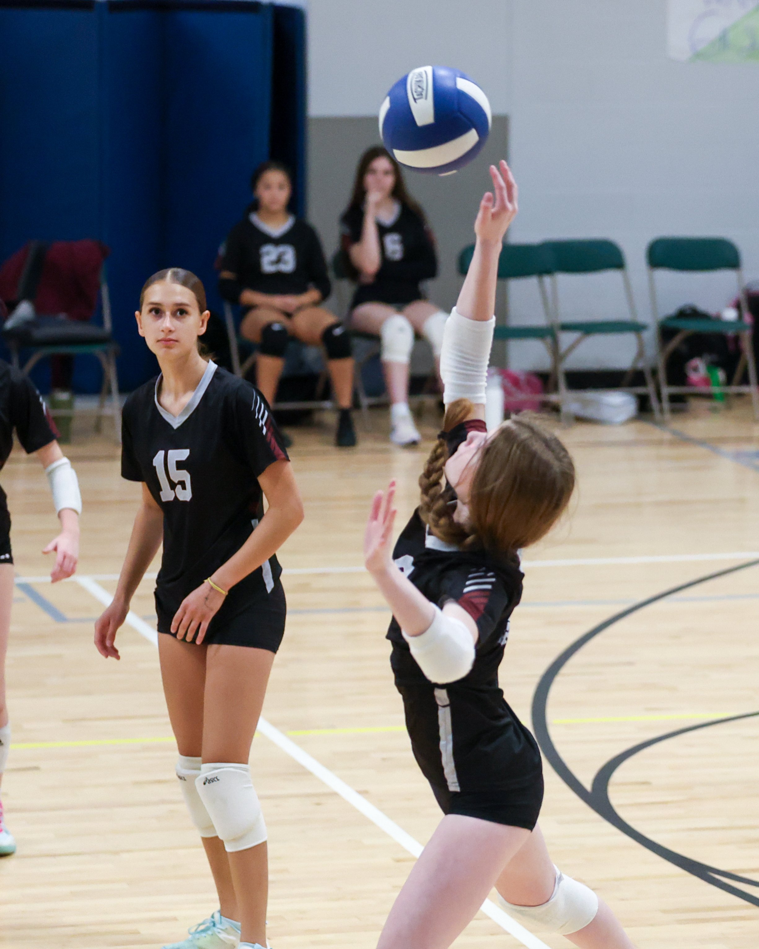 Mason girl returns the ball