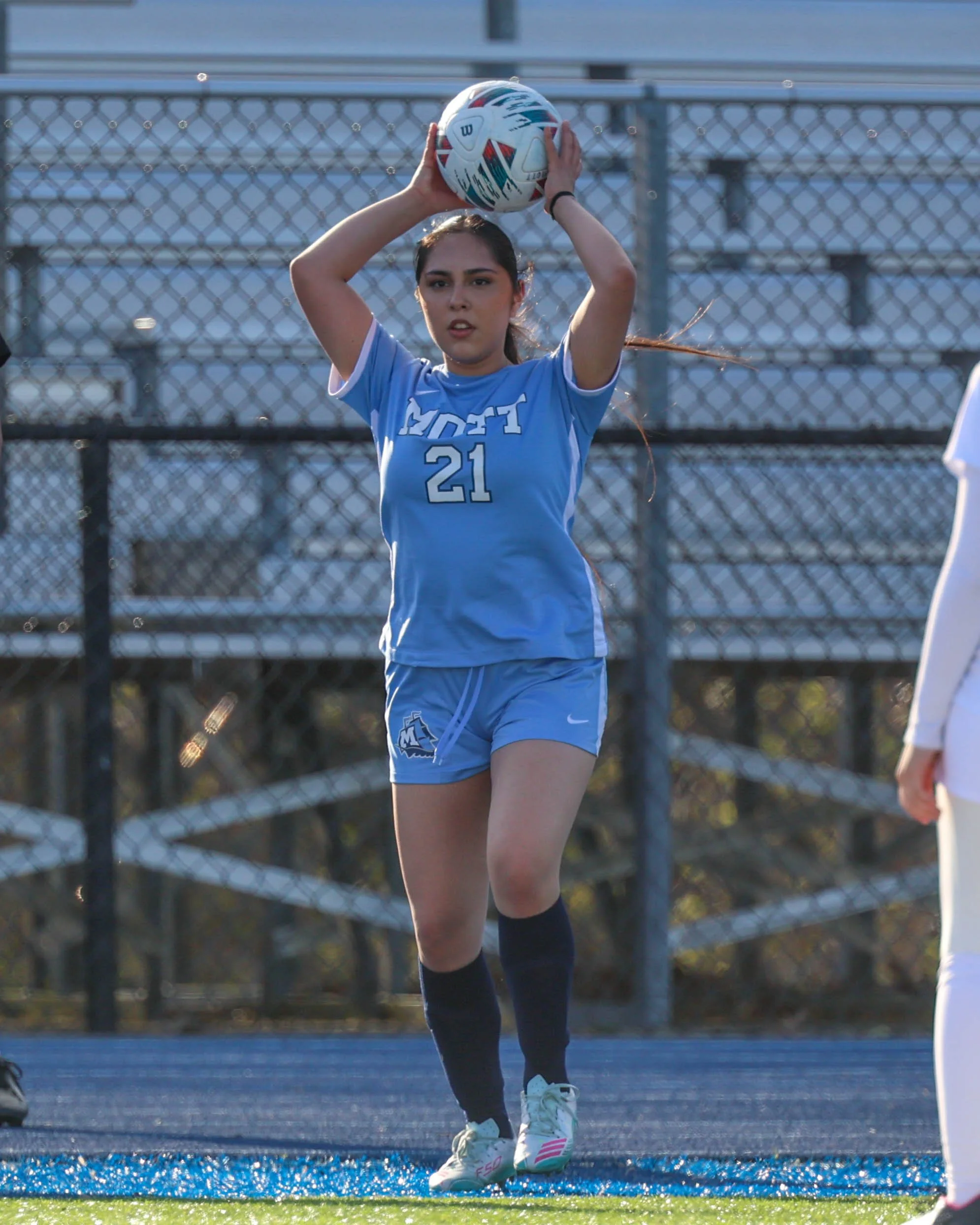 #21 throws the ball in play