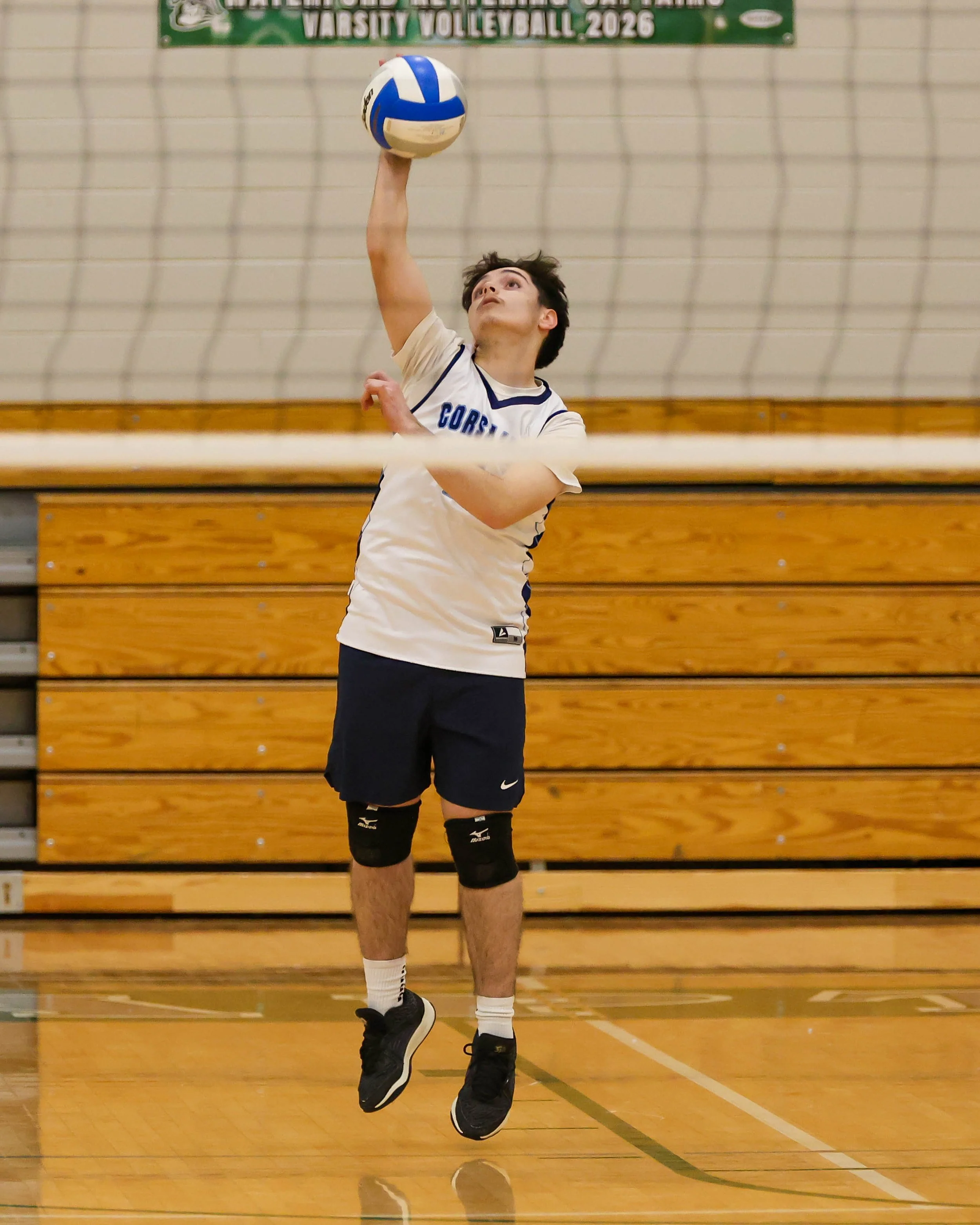 Mott #7 serves the ball