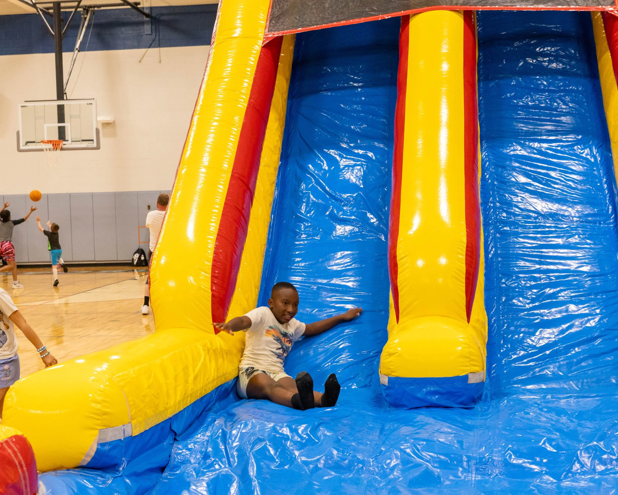 Boy at the end of the slide