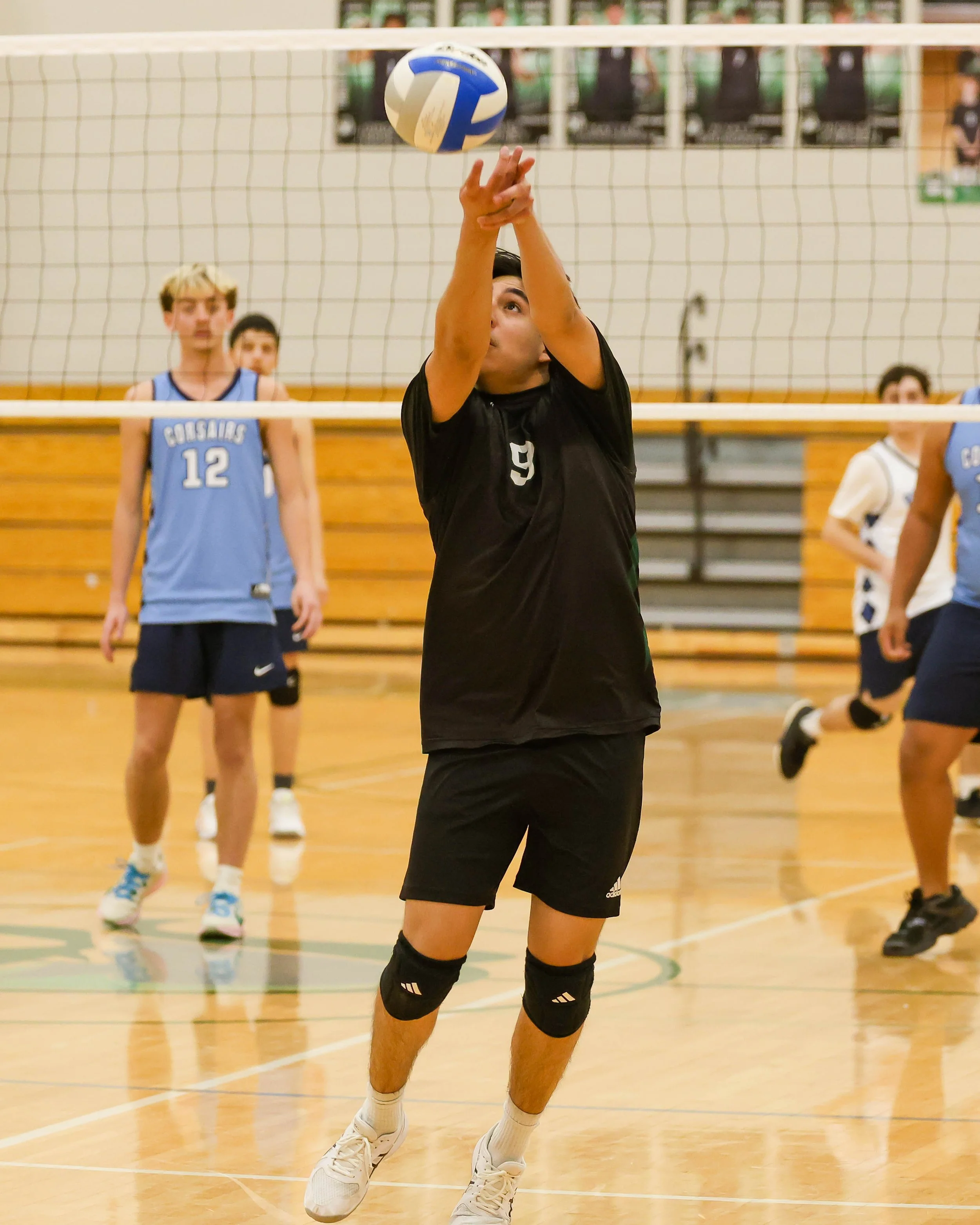 Kettering #9 returns the ball