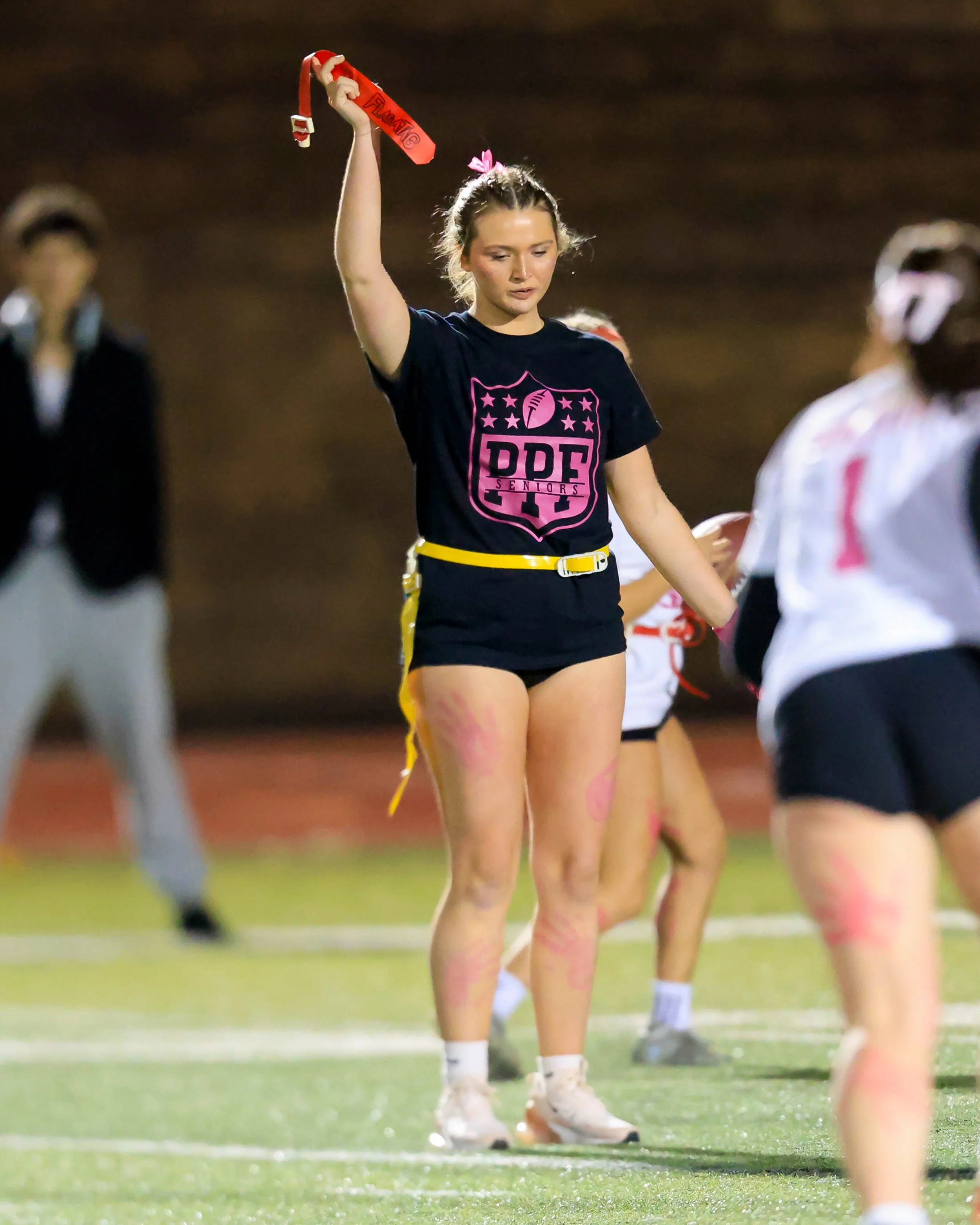 Senior with the flag