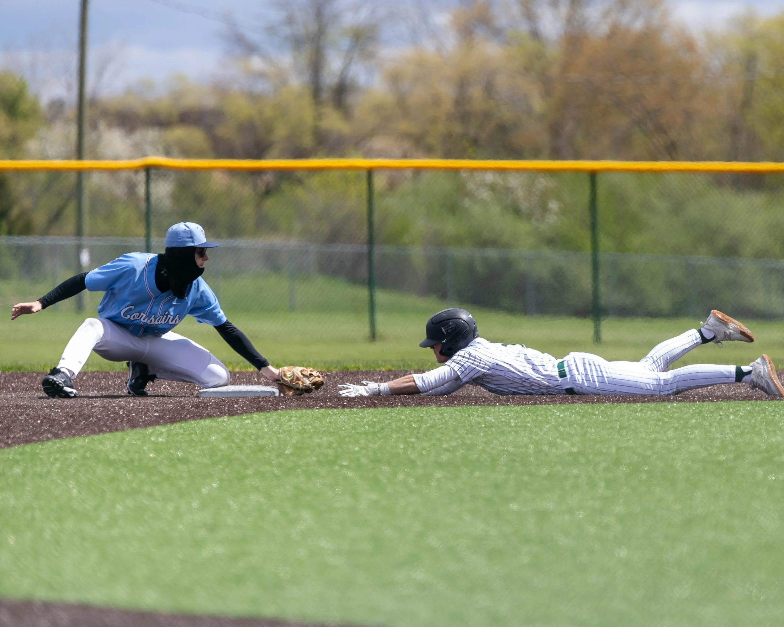 Kettering #5 slides into 2nd base
