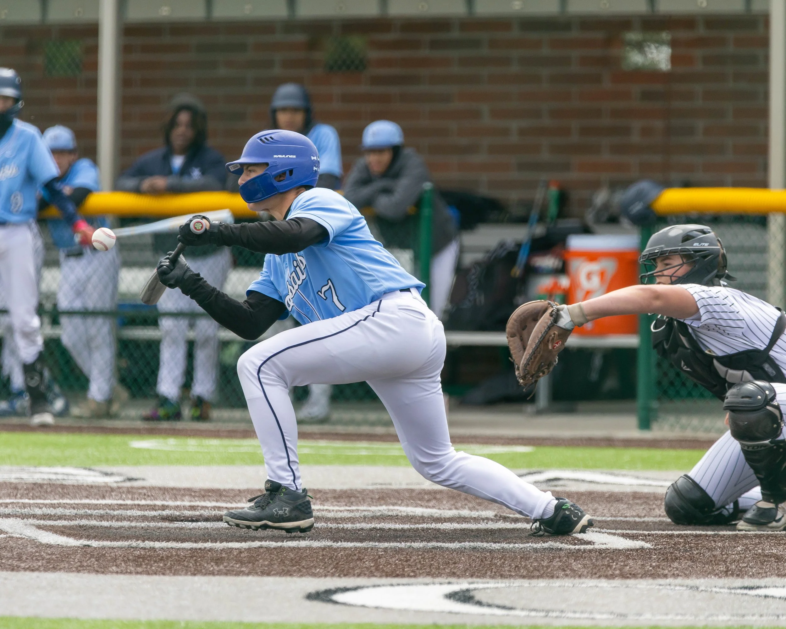 Mott #7 bunts the ball