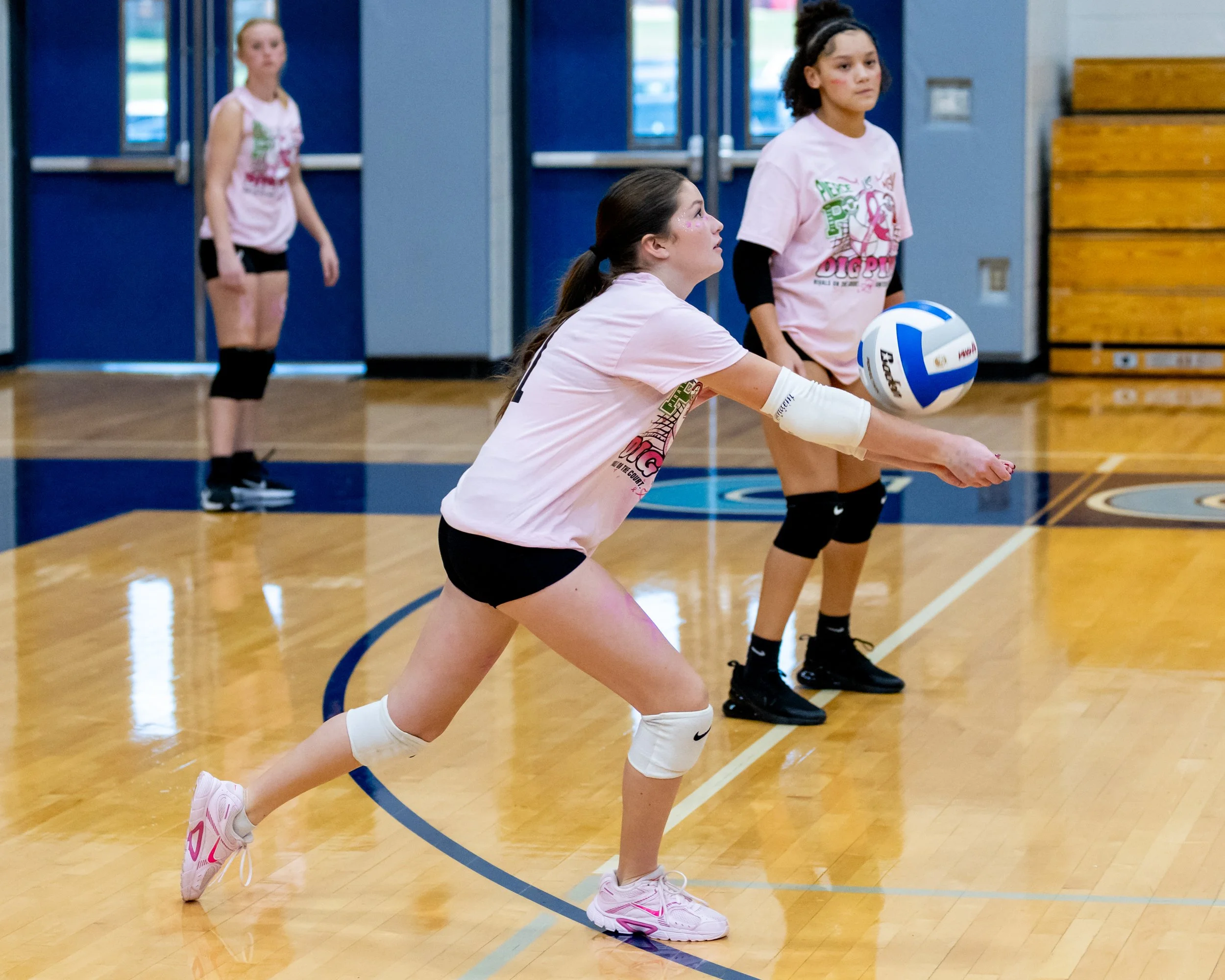 Mason player hits the ball