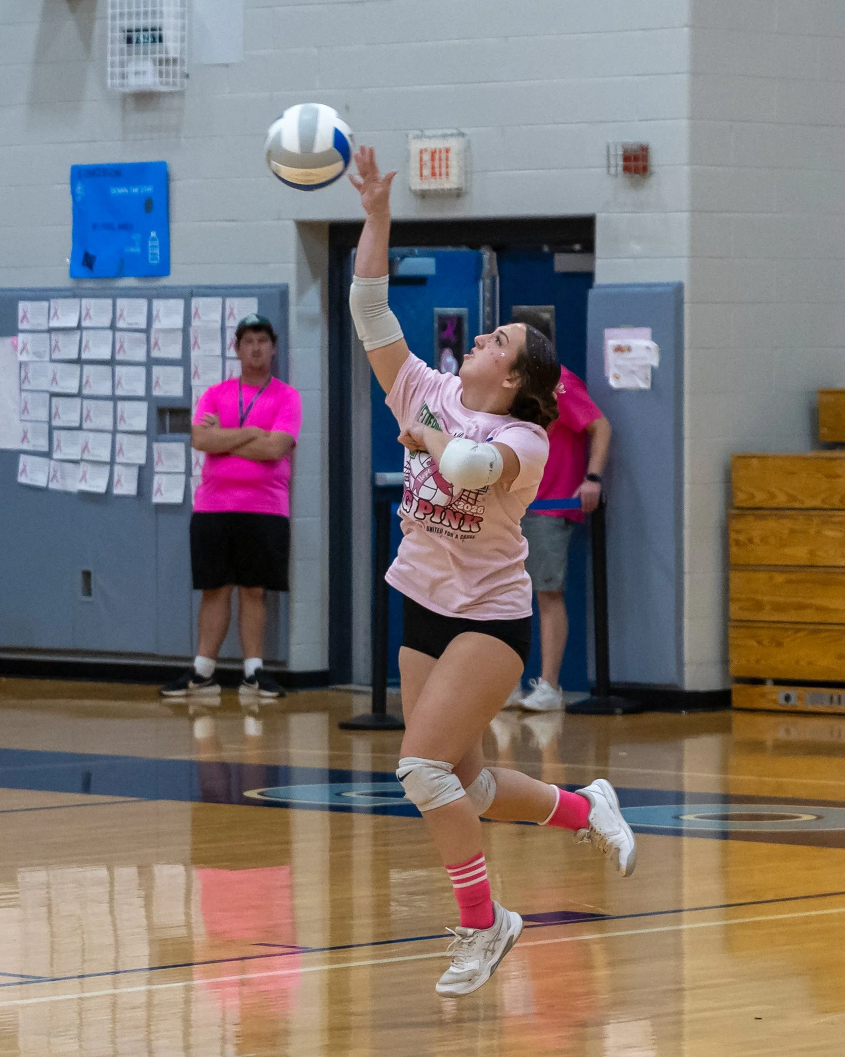 Mott player serves the ball