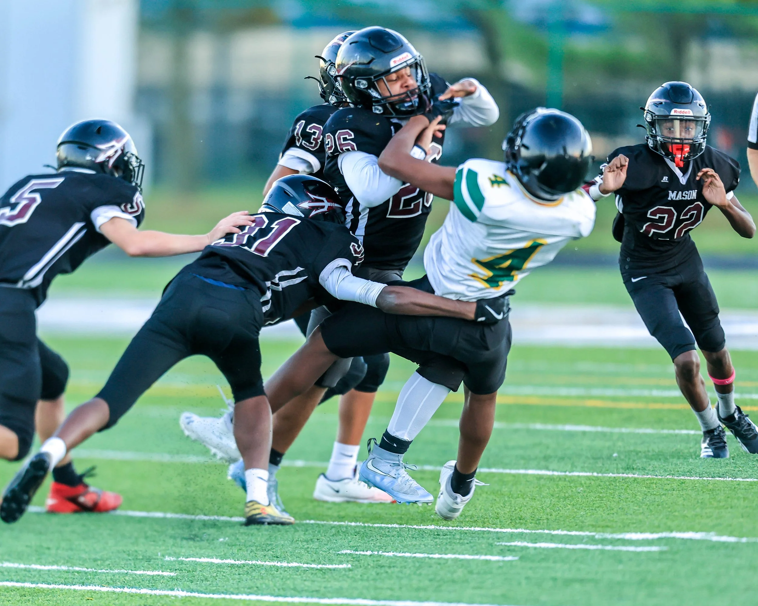 Pierce #4 gets hit by Mason #26