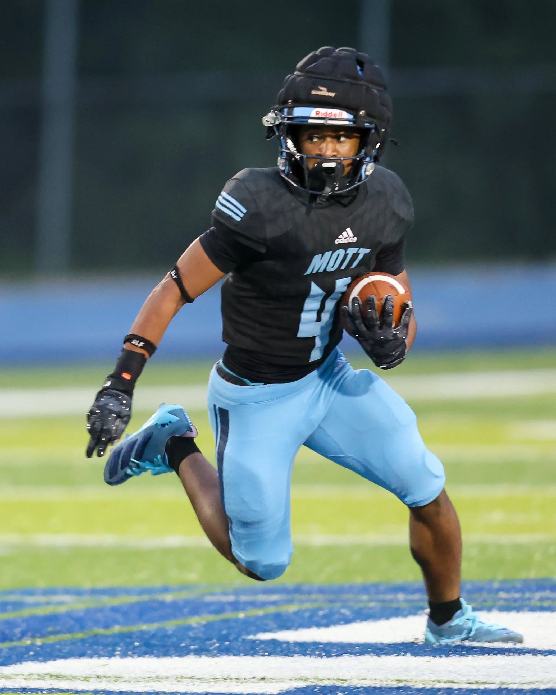 WK #4 carries the ball