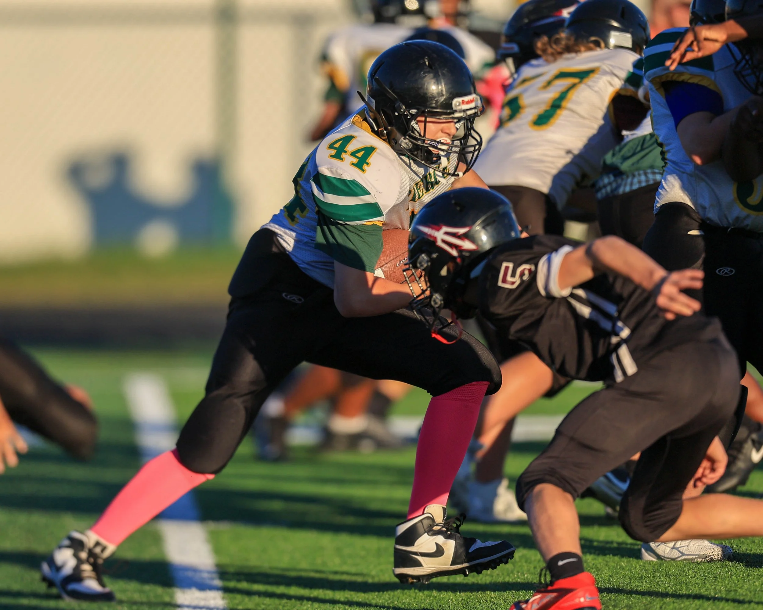 Pierce #44 running with the ball