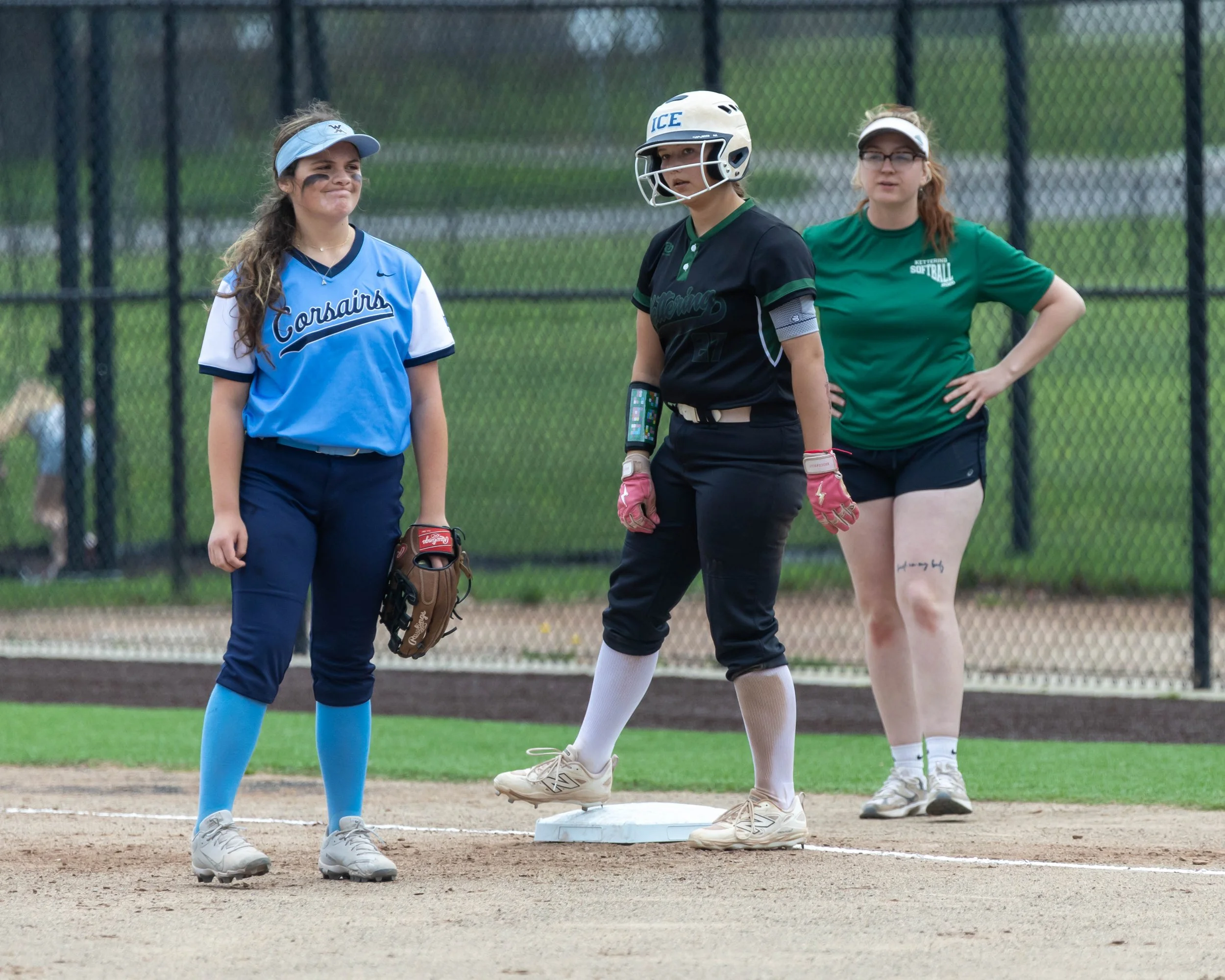 Kettering #27 stands on first base