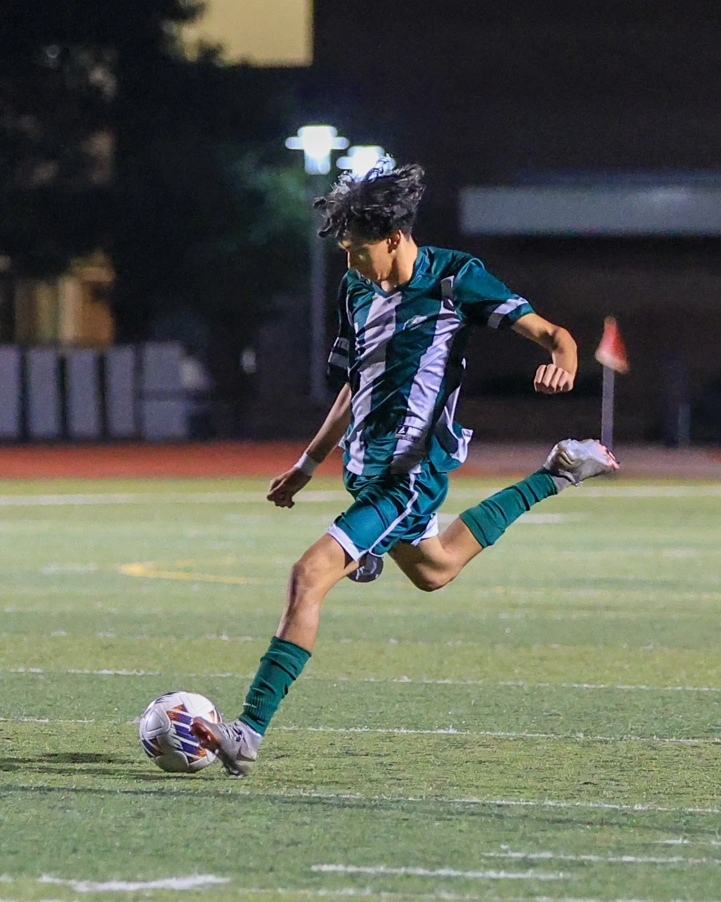 WK player kicks the ball