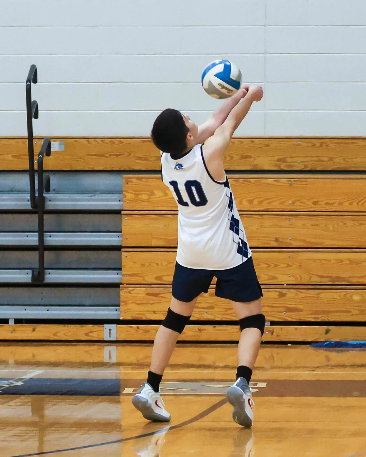 Mott #10 returns the ball