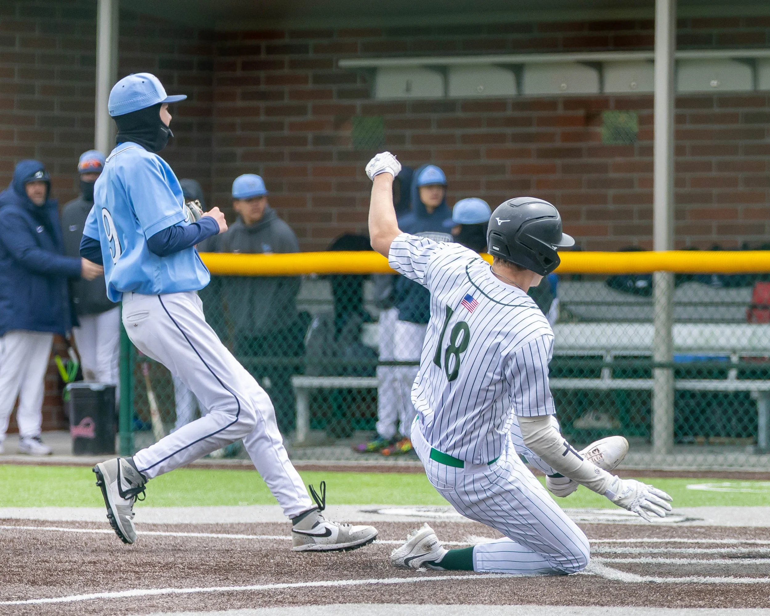 Kettering #18 scores a run