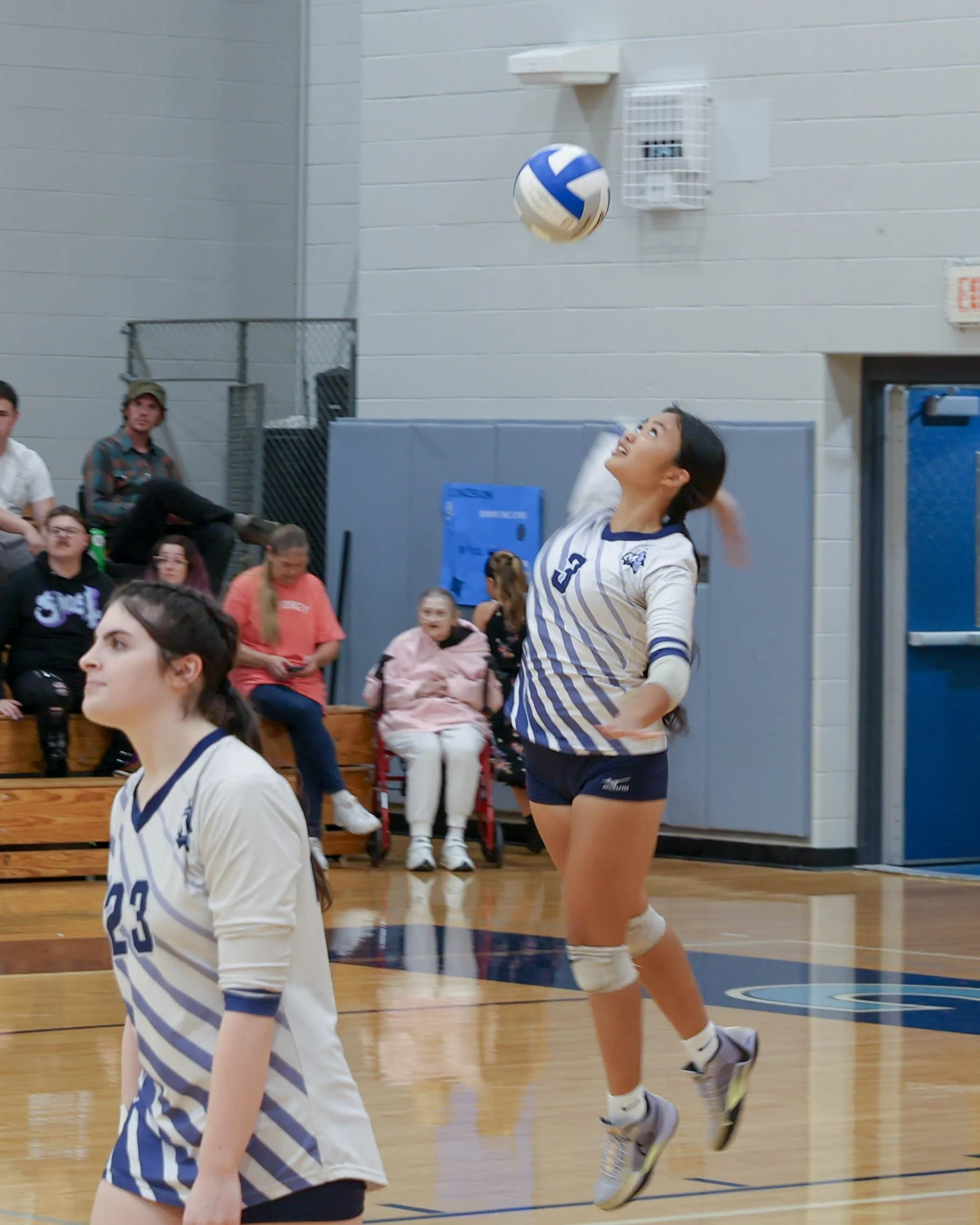 Mott #3 serves the ball