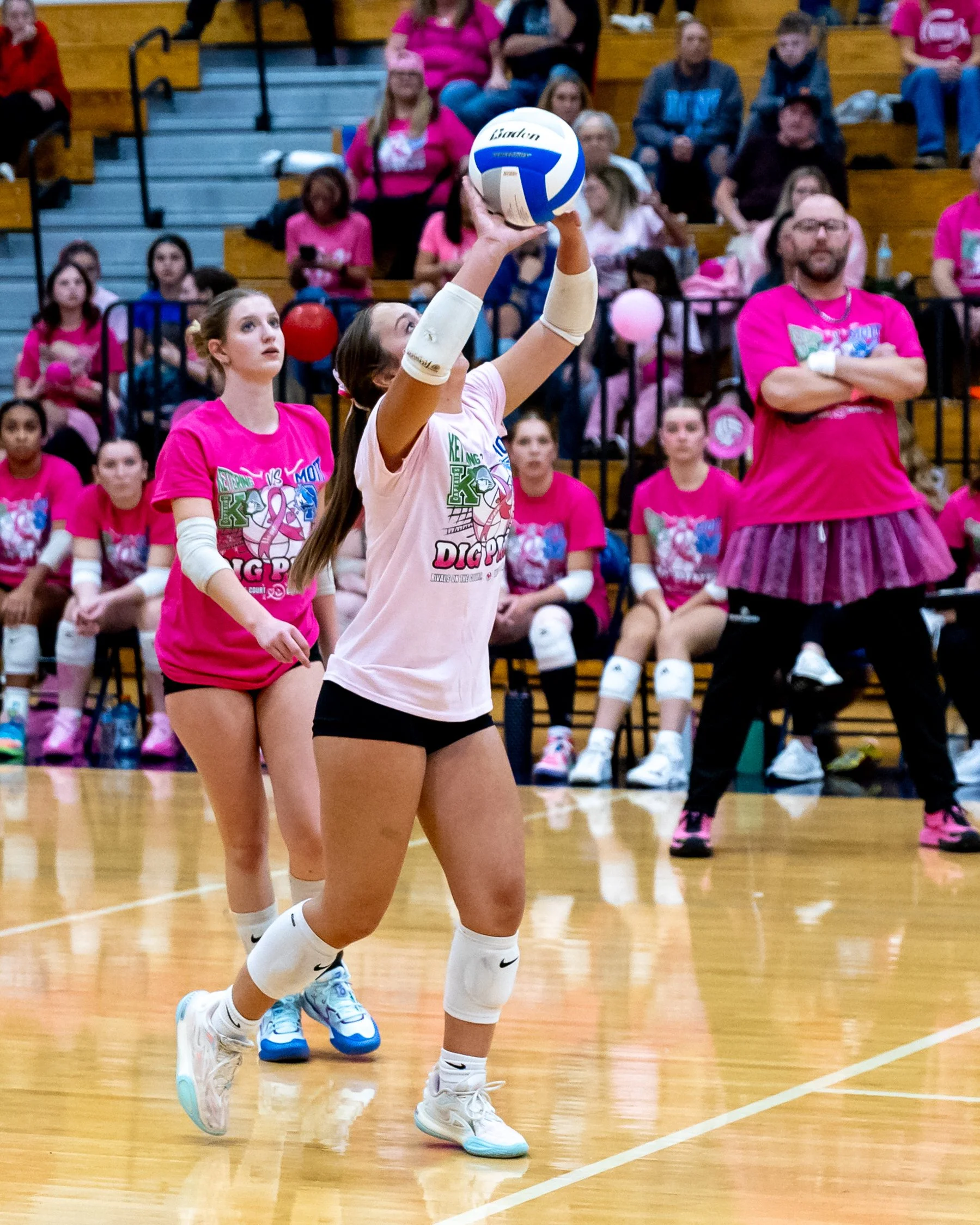 Kettering player sets the ball
