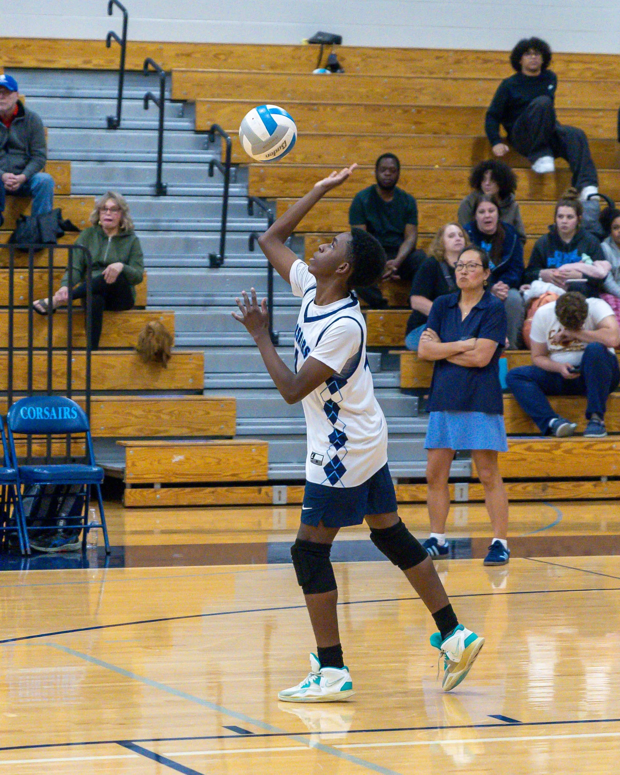 Mott #4 serves the ball