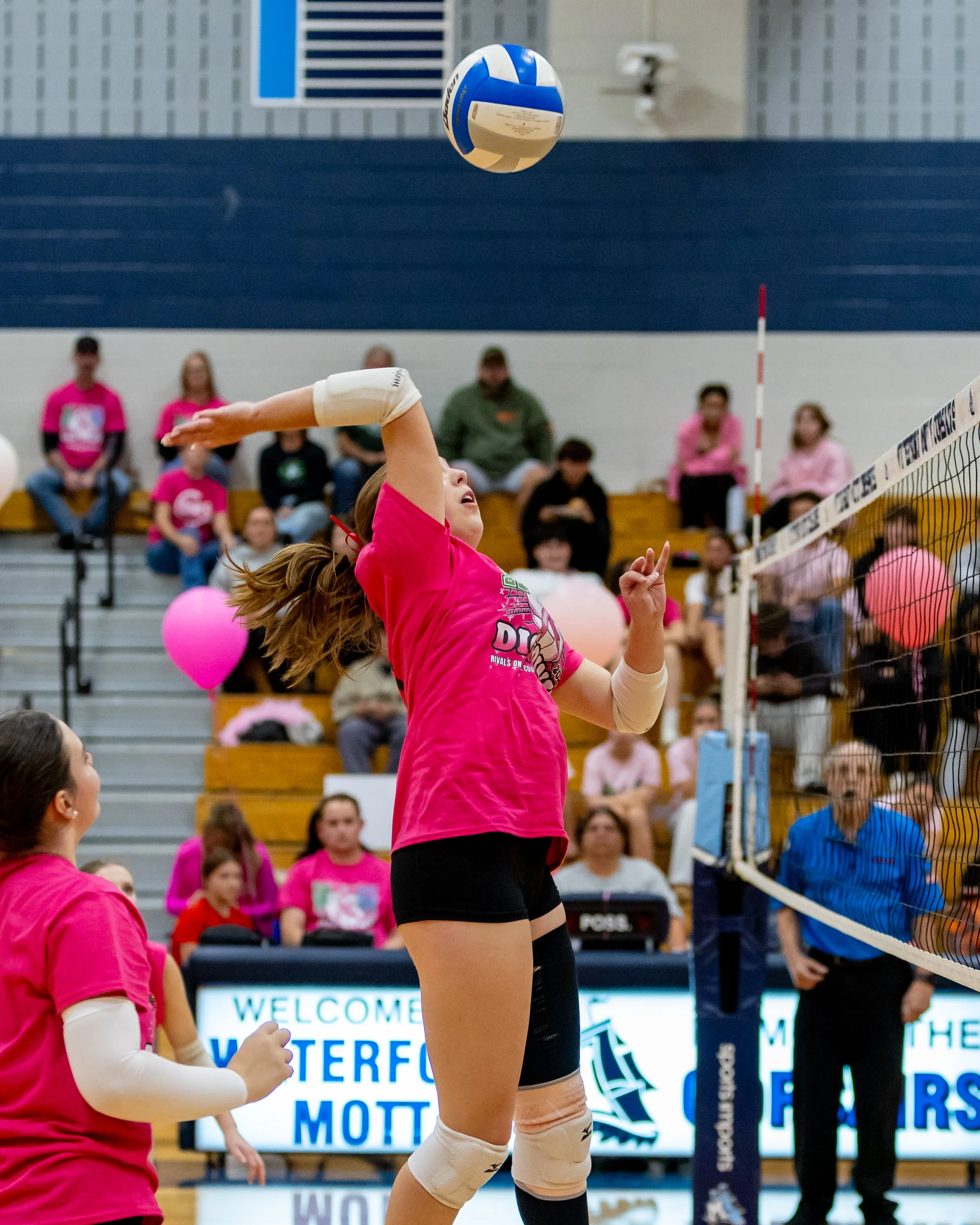 Kettering player hits the ball