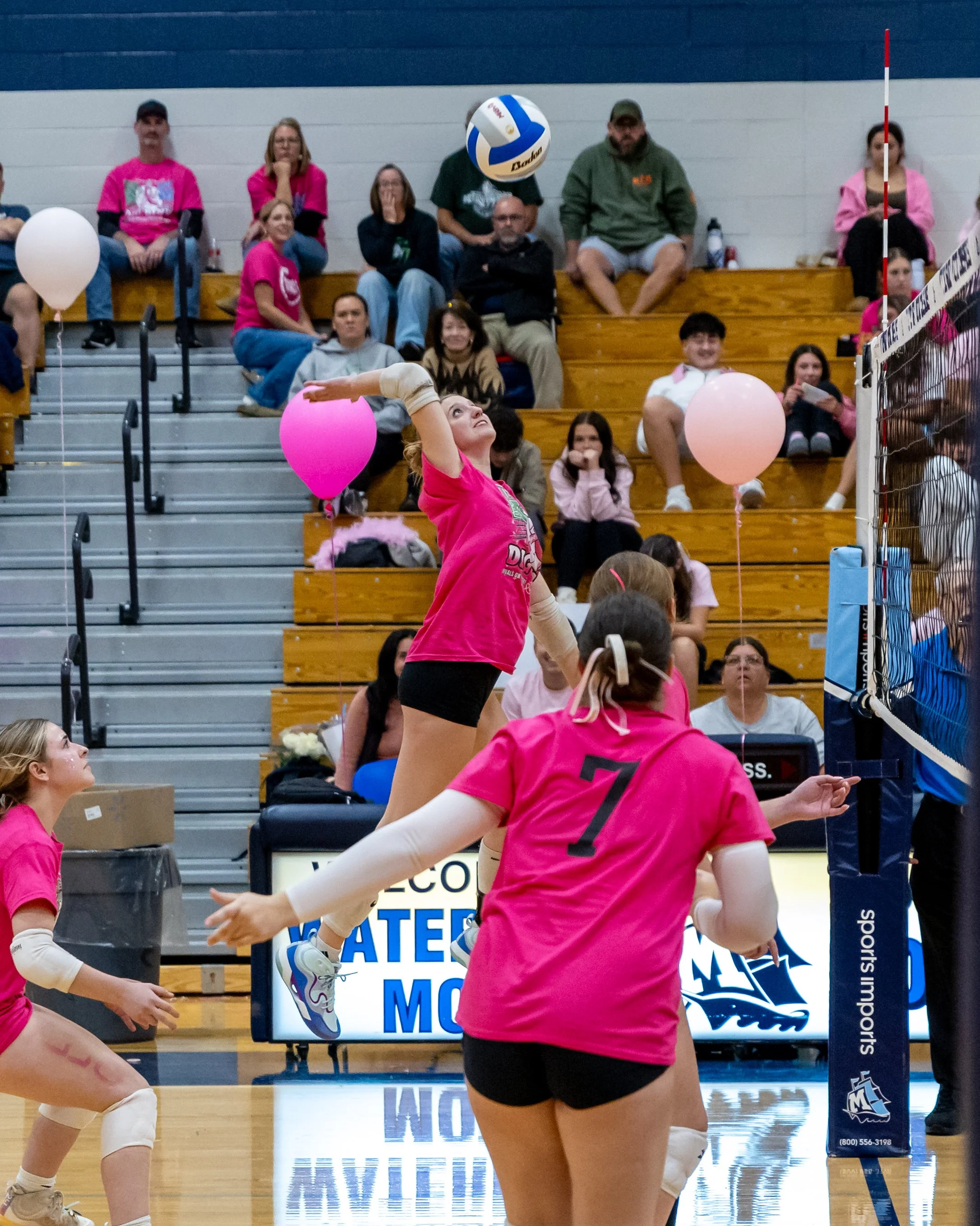 Kettering player hits the ball