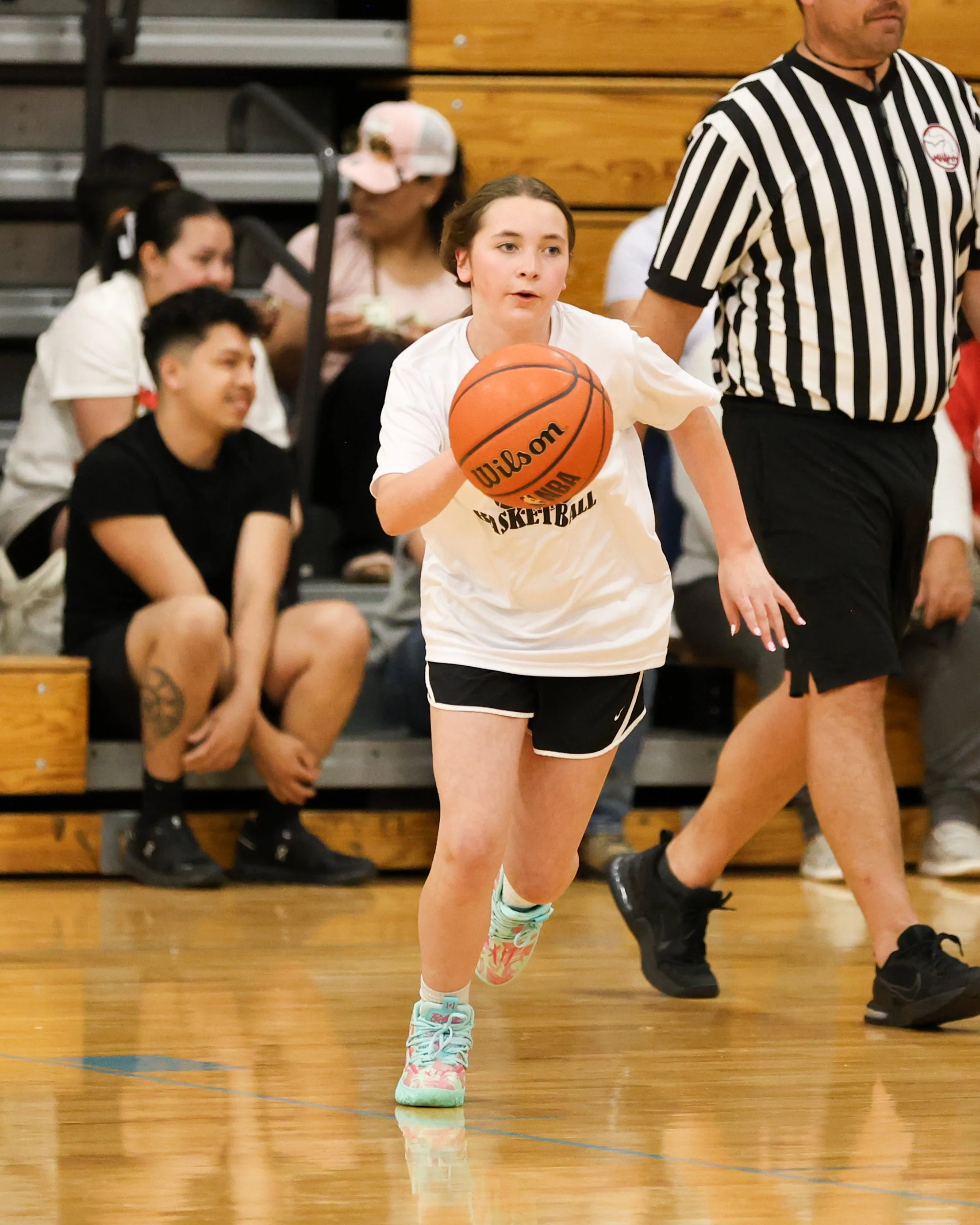 Beaumont girl dribbles the ball