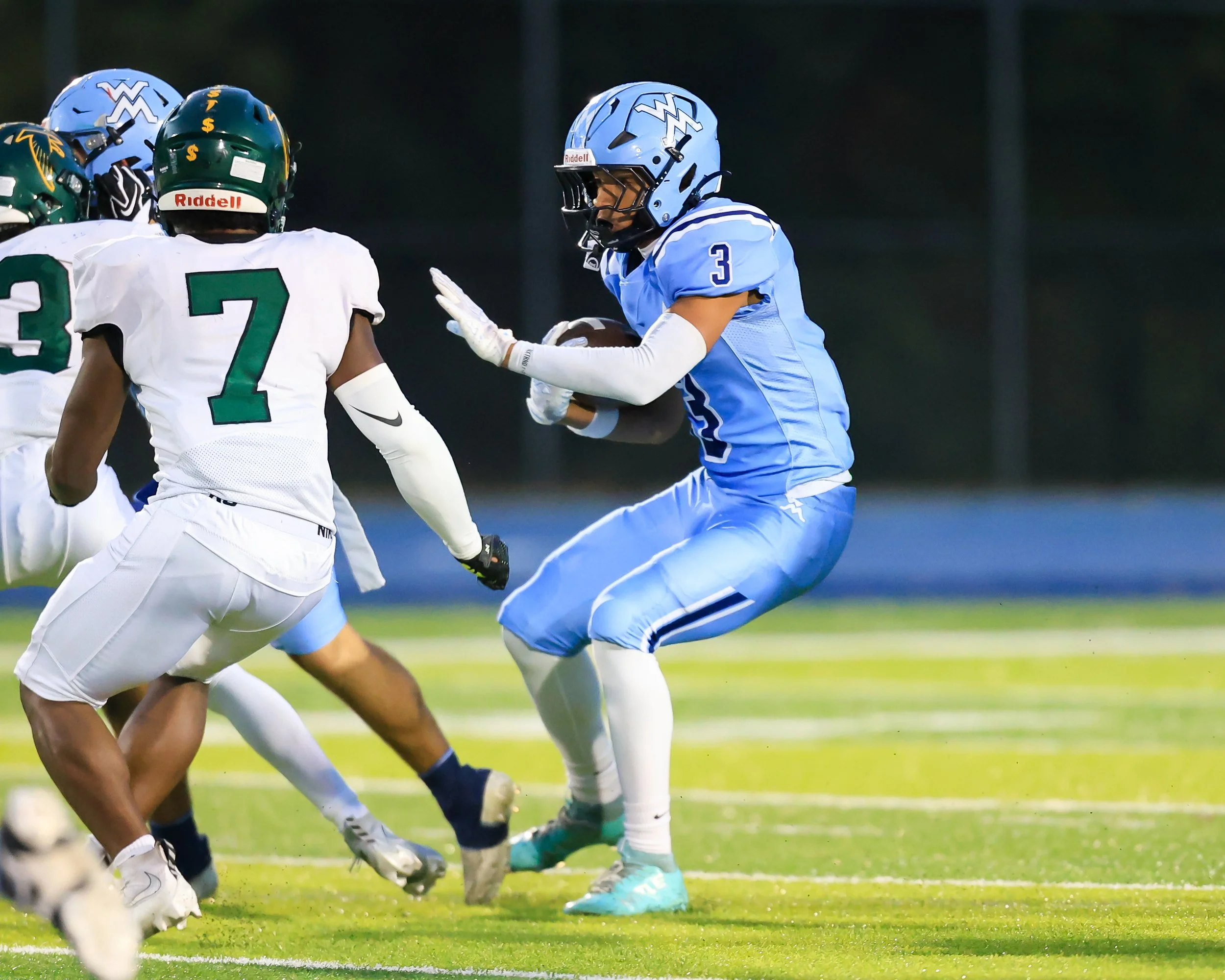 Mott #3 running with the ball