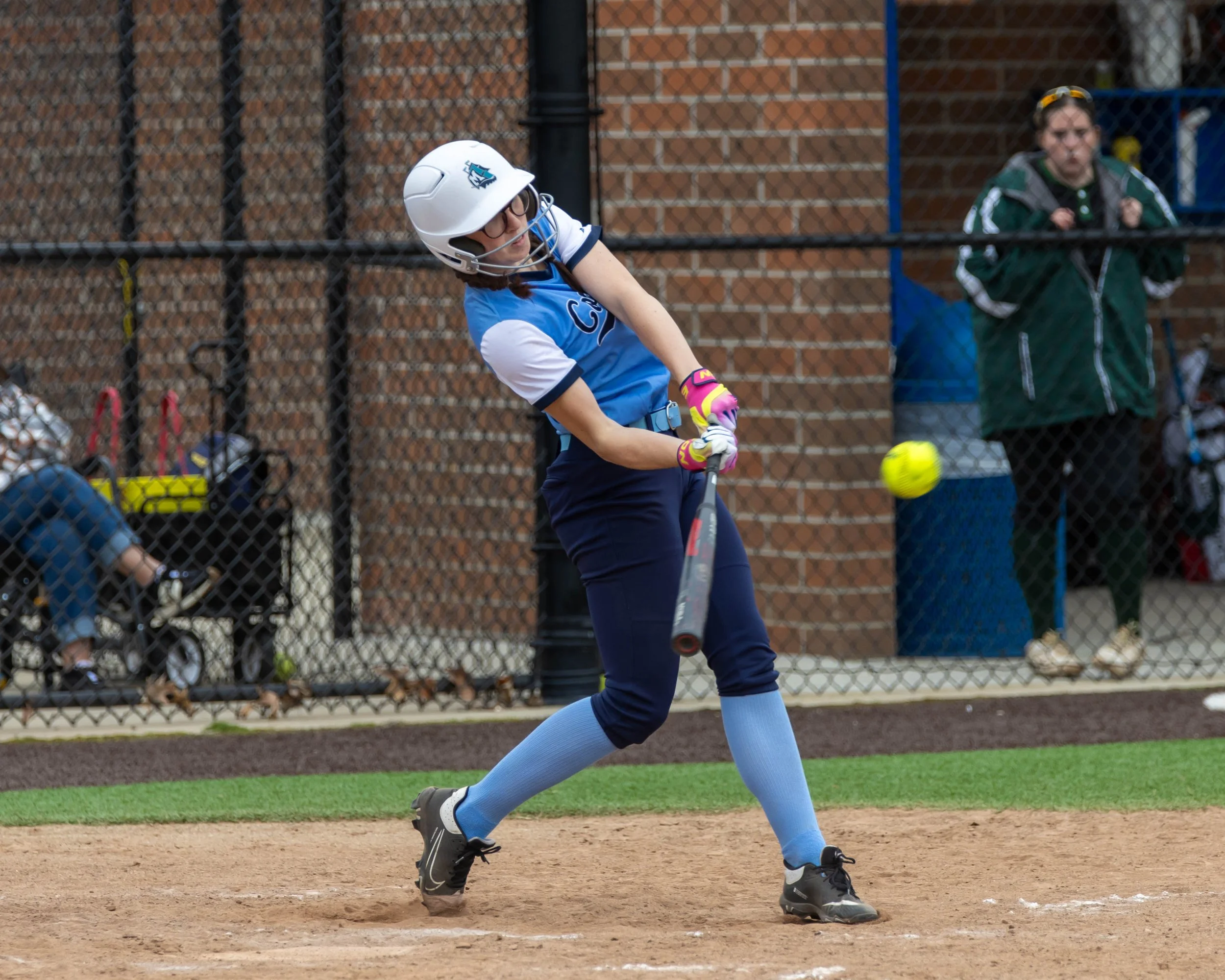 Mott batter hits the ball