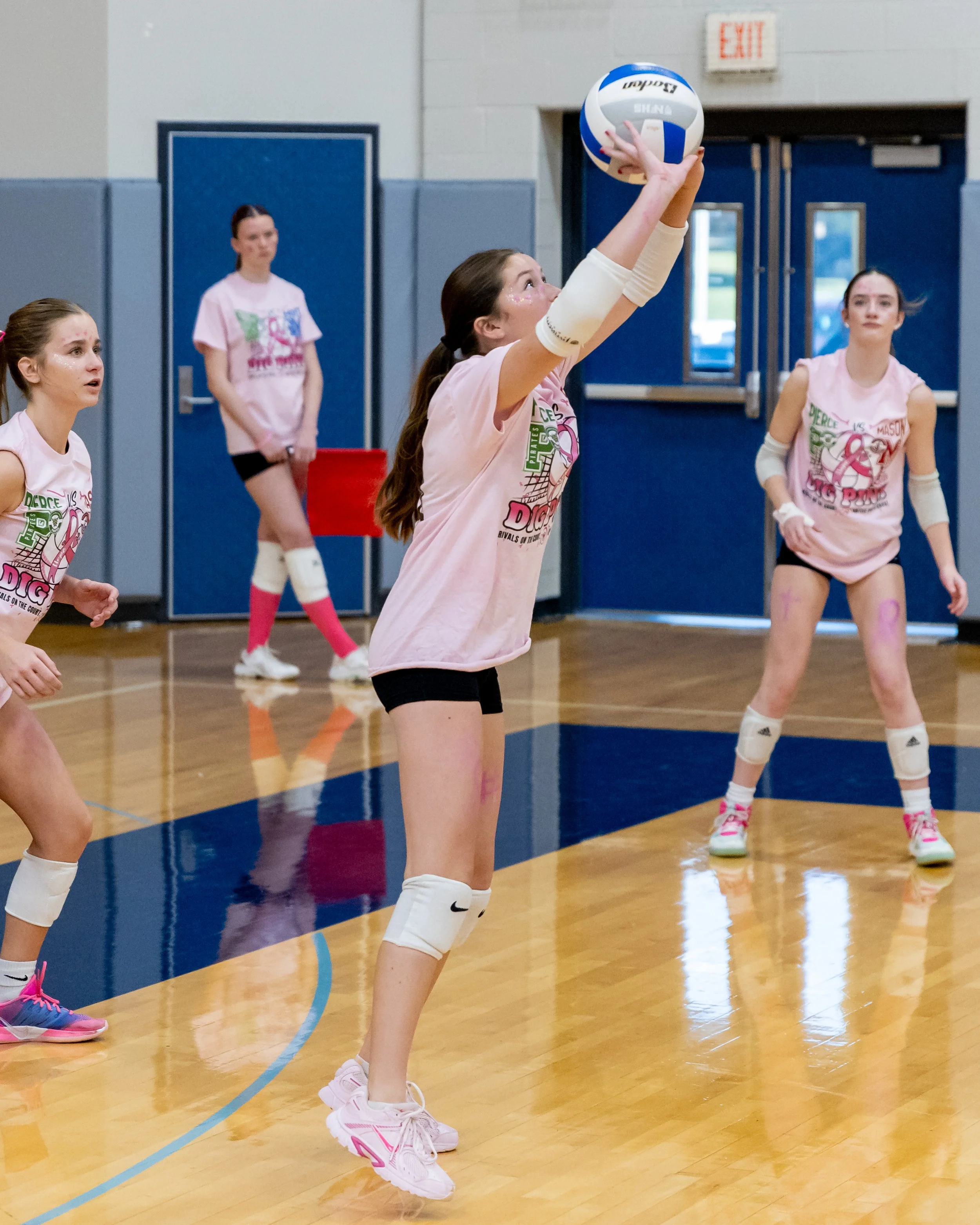 Mason player hits the ball