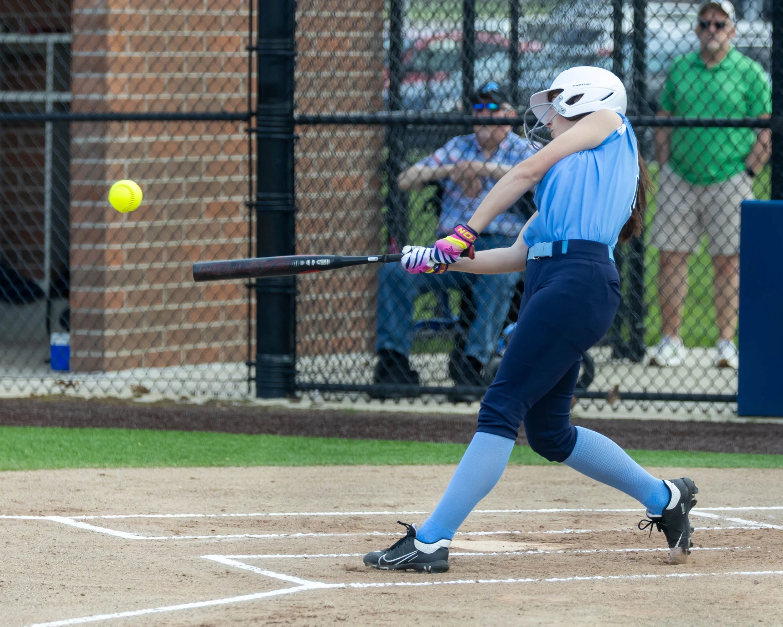 Mott batter hits the ball