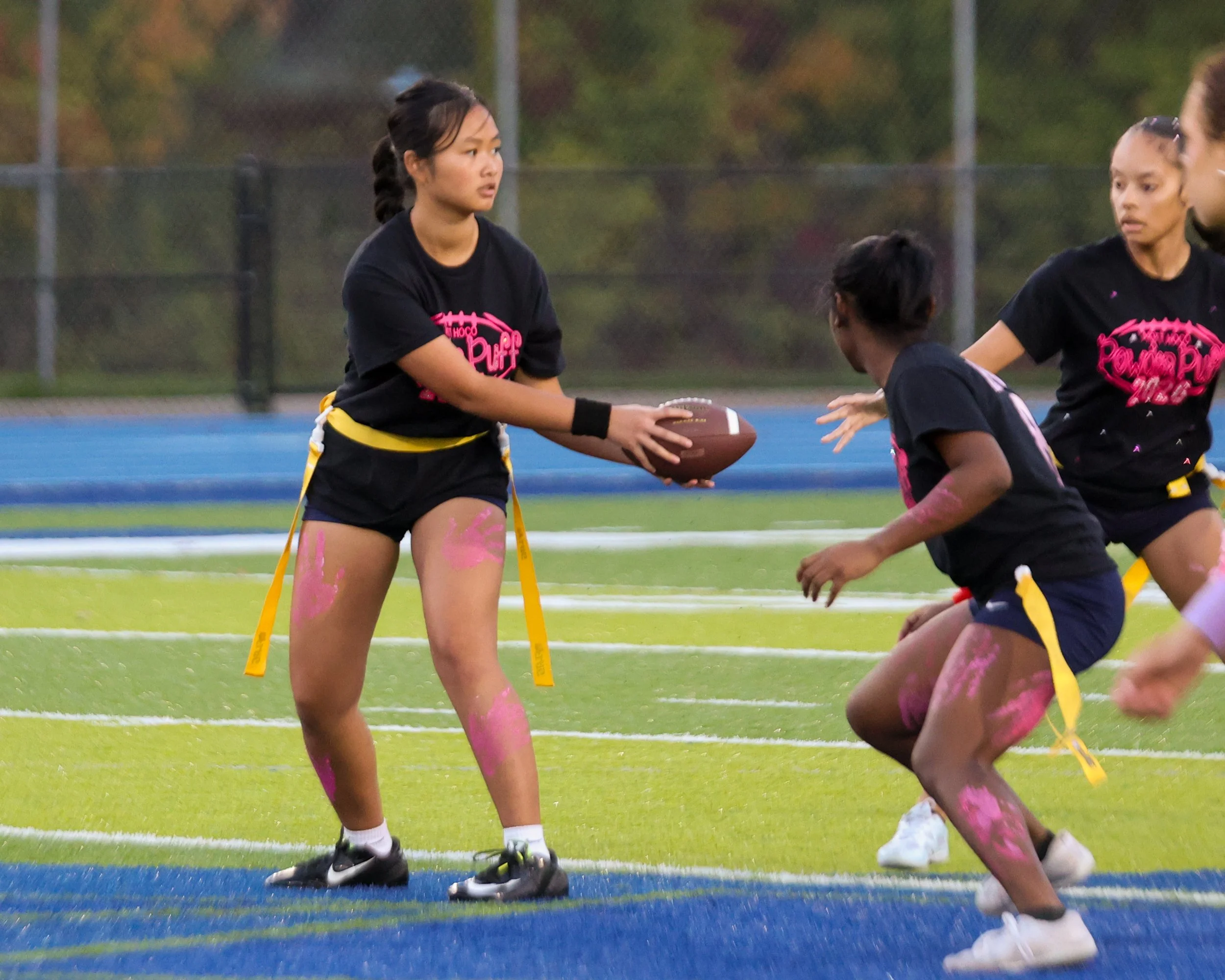 WM Senior QB hands the ball off
