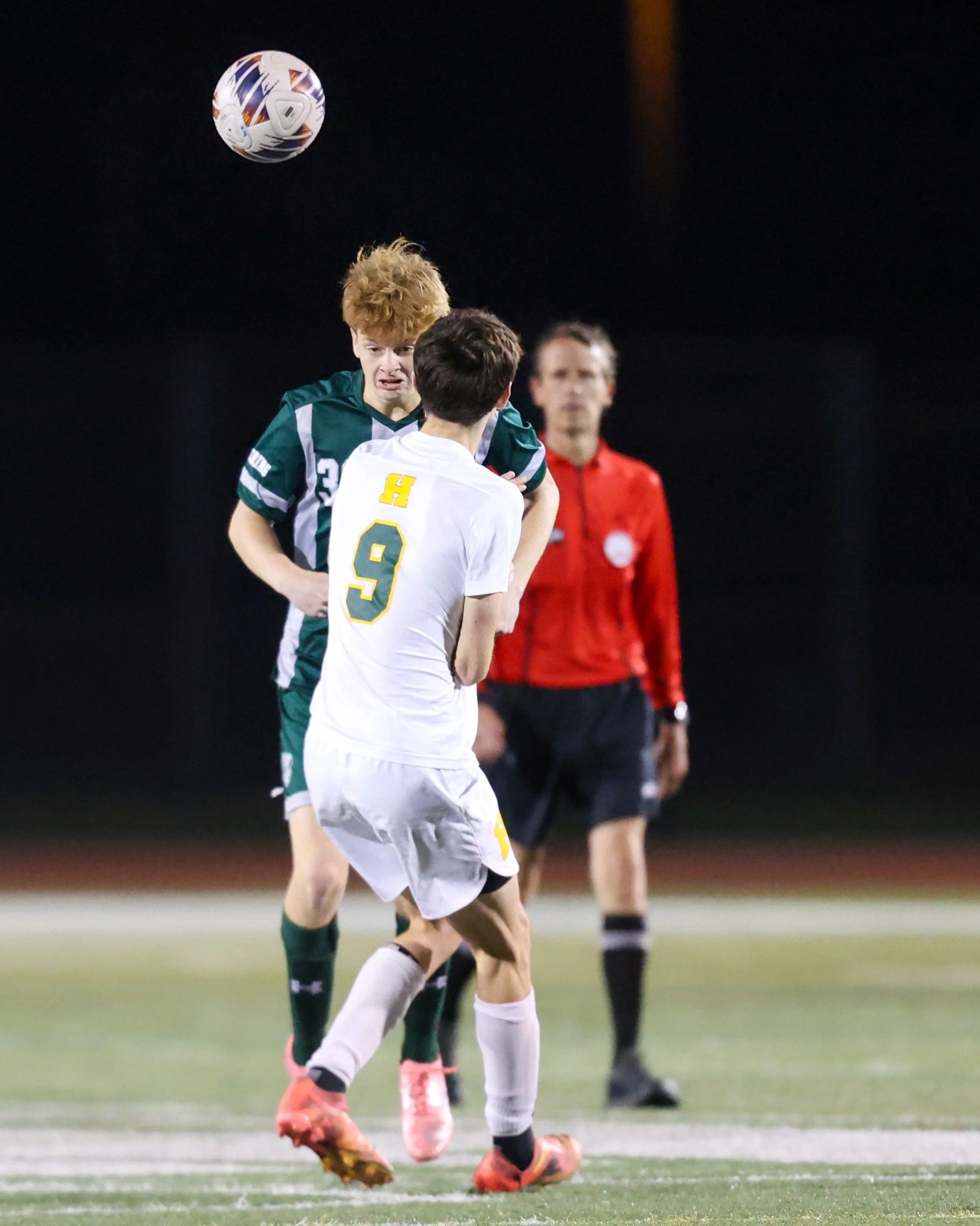 WK #36 heads the ball